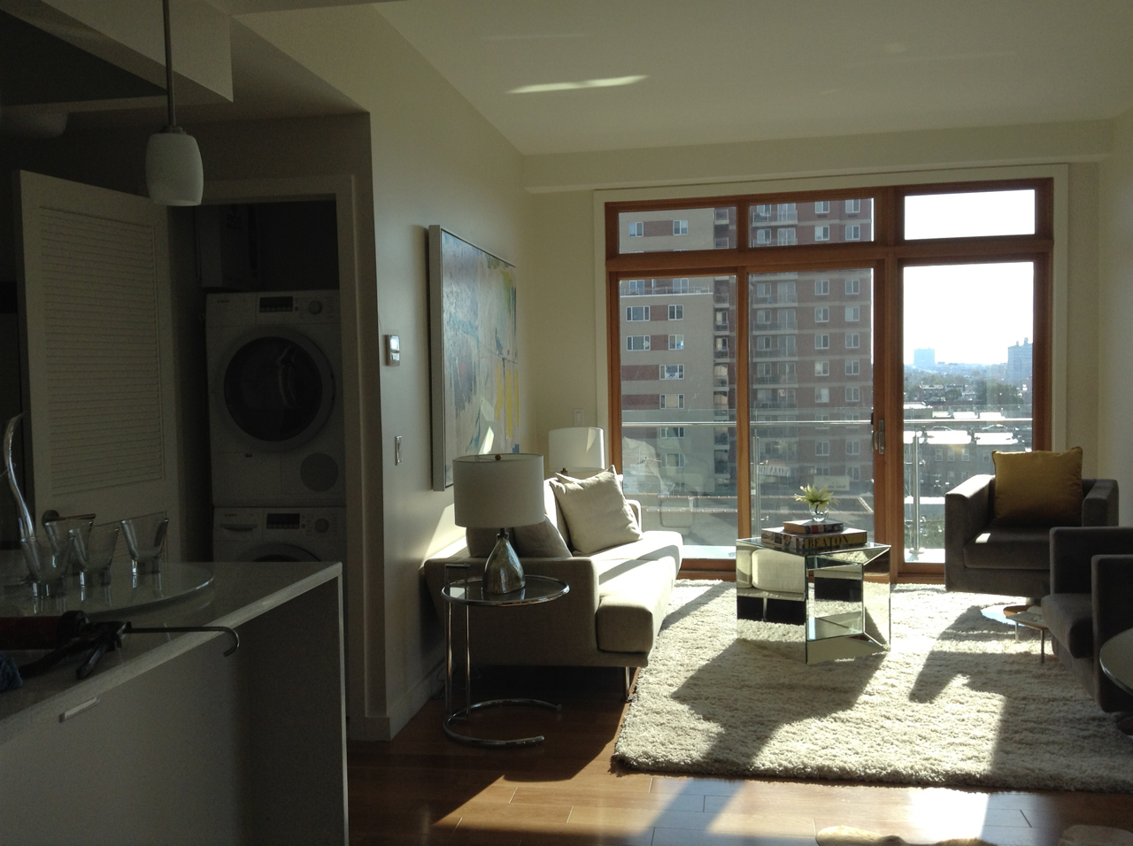 548 4th Avenue, Unit 8A Brooklyn, NY 11215 - Photo 9 of 21 a living room with furniture and a floor to ceiling window