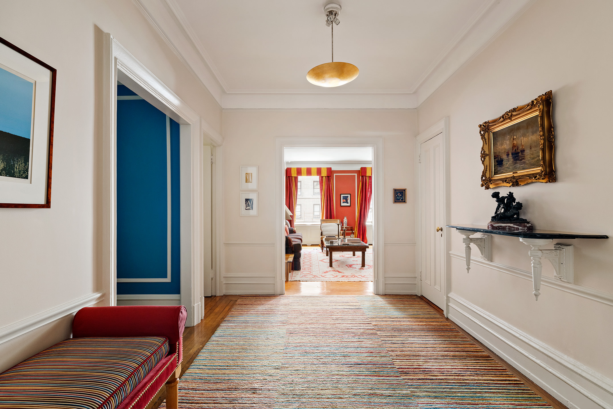 151 West 86th Street, Unit 4D Manhattan, NY 10024 - Photo 3 of 15 a living room with furniture and a wooden floor