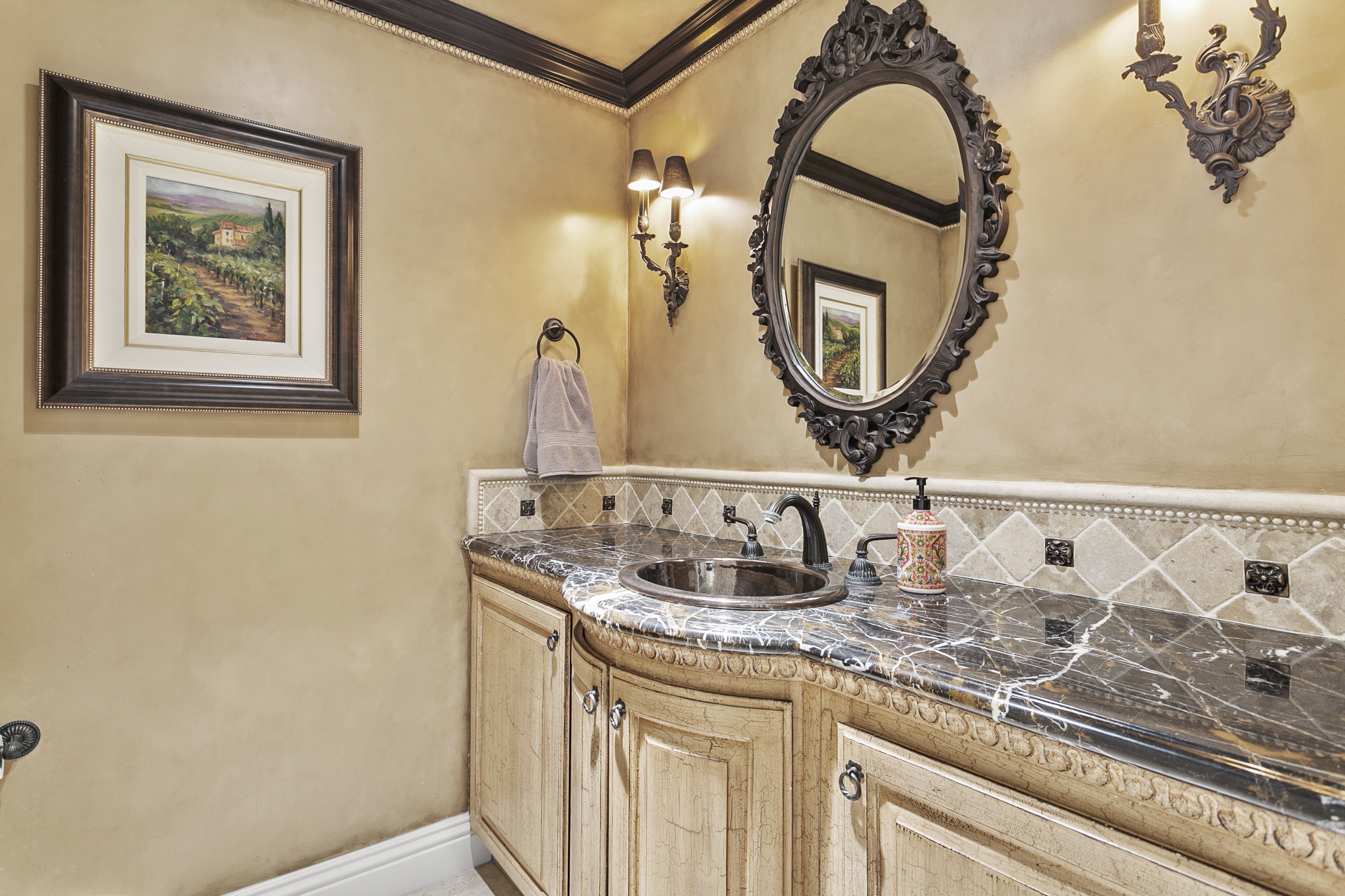 10 Vista Montemar Laguna Niguel, CA 92677 - Photo 15 of 67 a bathroom with a granite countertop sink and a mirror