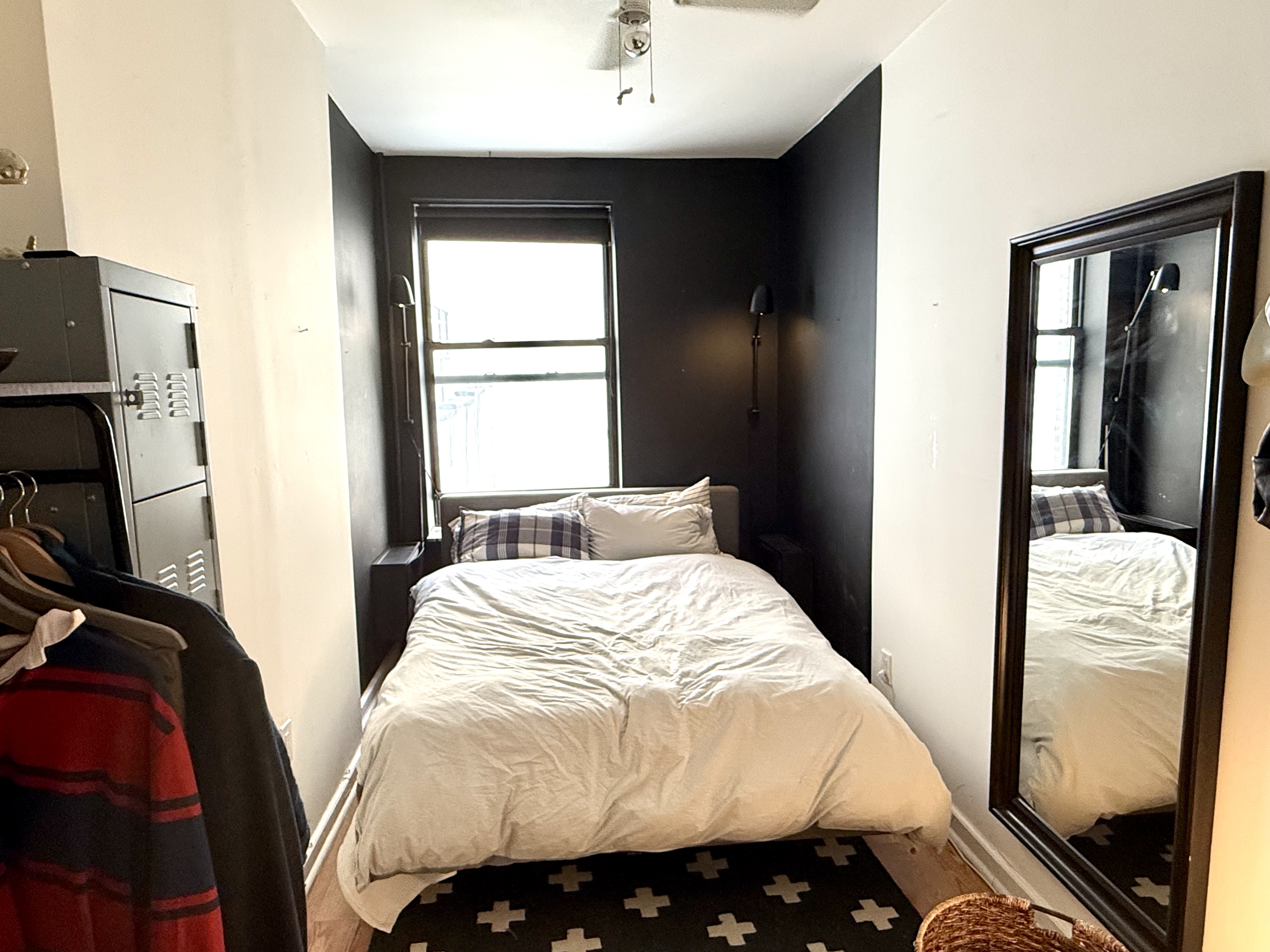 Address Upon Request Manhattan, NY 10029 - Photo 6 of 11 a bedroom with a bed and a window