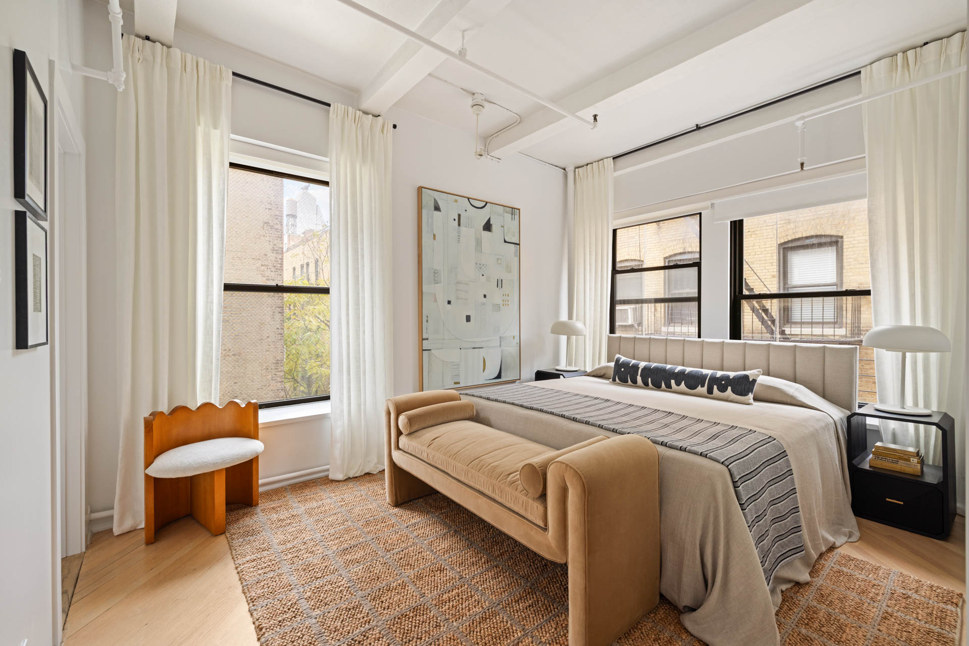 130 West 17th Street, Unit 5S Manhattan, NY 10011 - Photo 11 of 17 a bedroom with a bed and a window