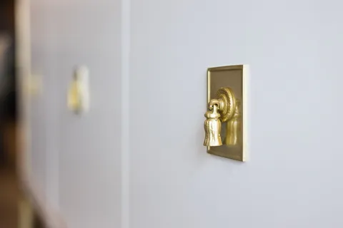 a table with a vase and flowers on it