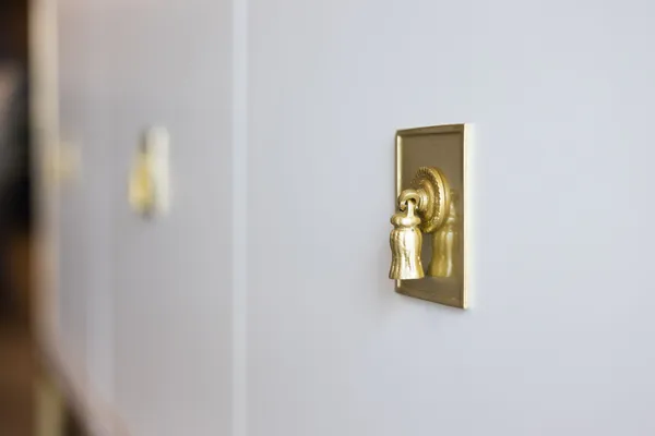 a table with a vase and flowers on it