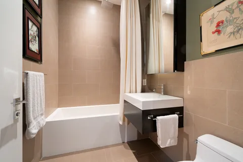 a bathroom with a sink and a bathtub