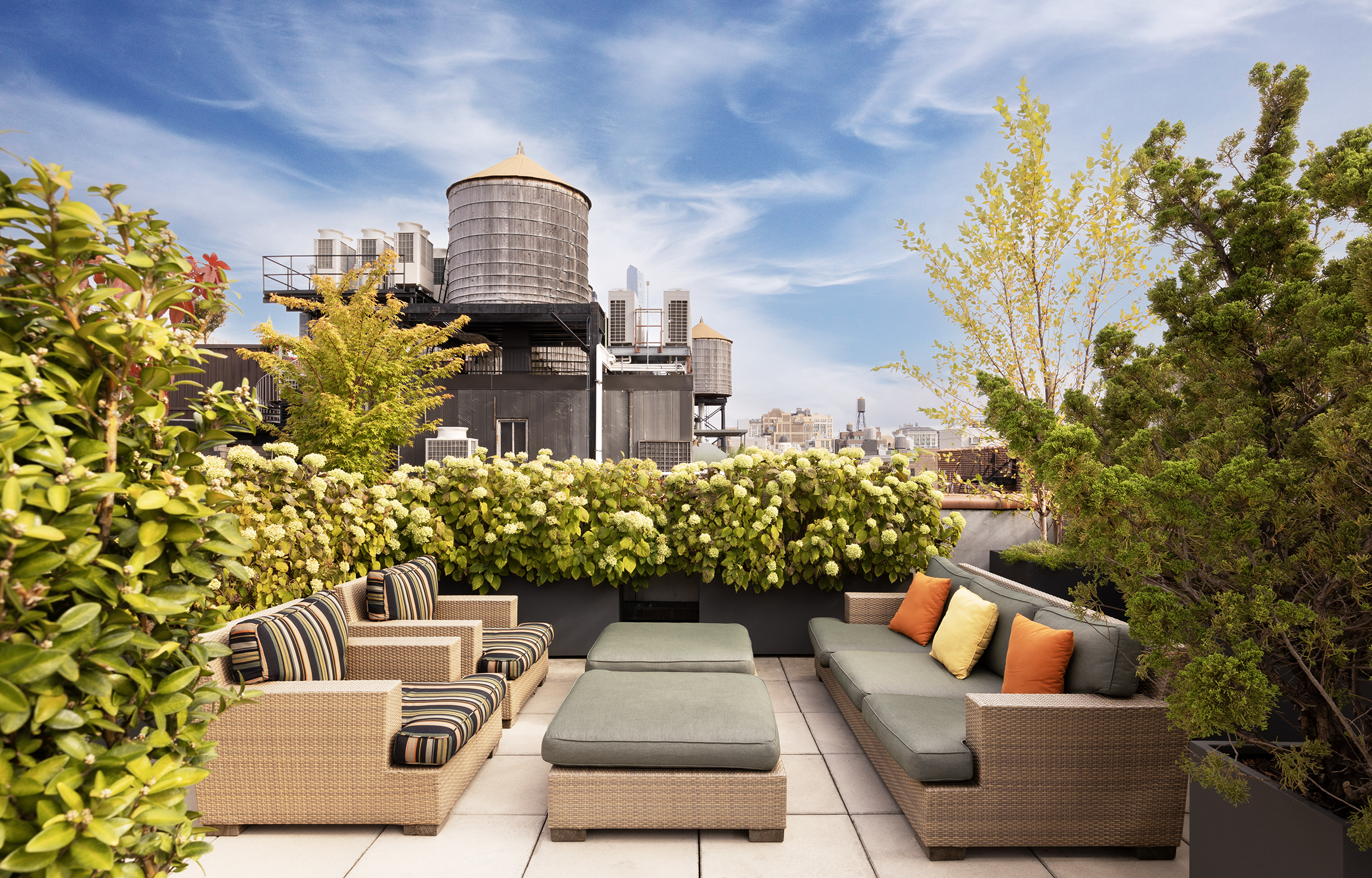 140 West 22nd Street, Unit PHC Manhattan, NY 10011 - Photo 14 of 15 a outdoor living space with furniture and a fireplace