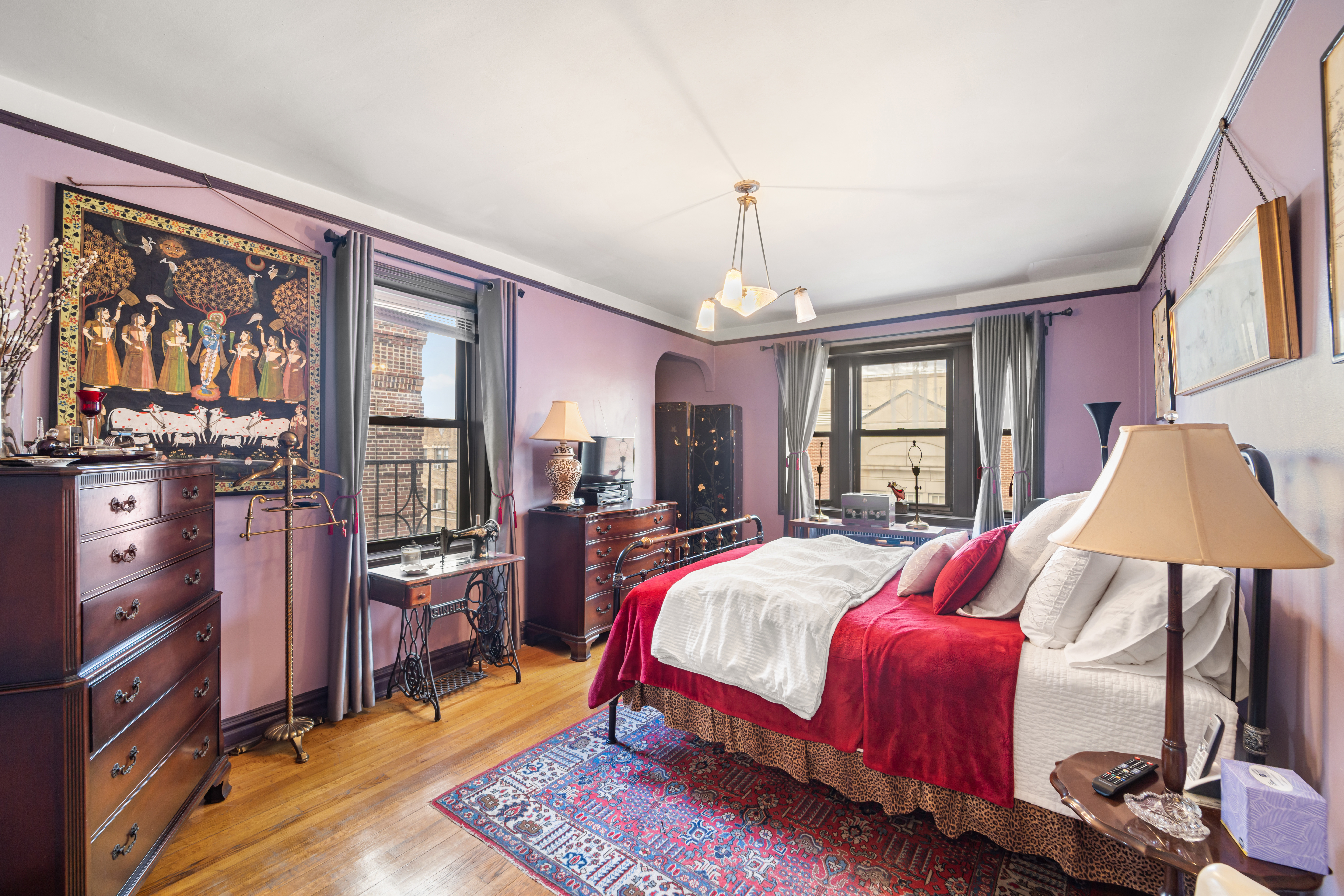 34-24 82nd Street, Unit 6N Queens, NY 11372 - Photo 9 of 15 a bedroom with bed and window