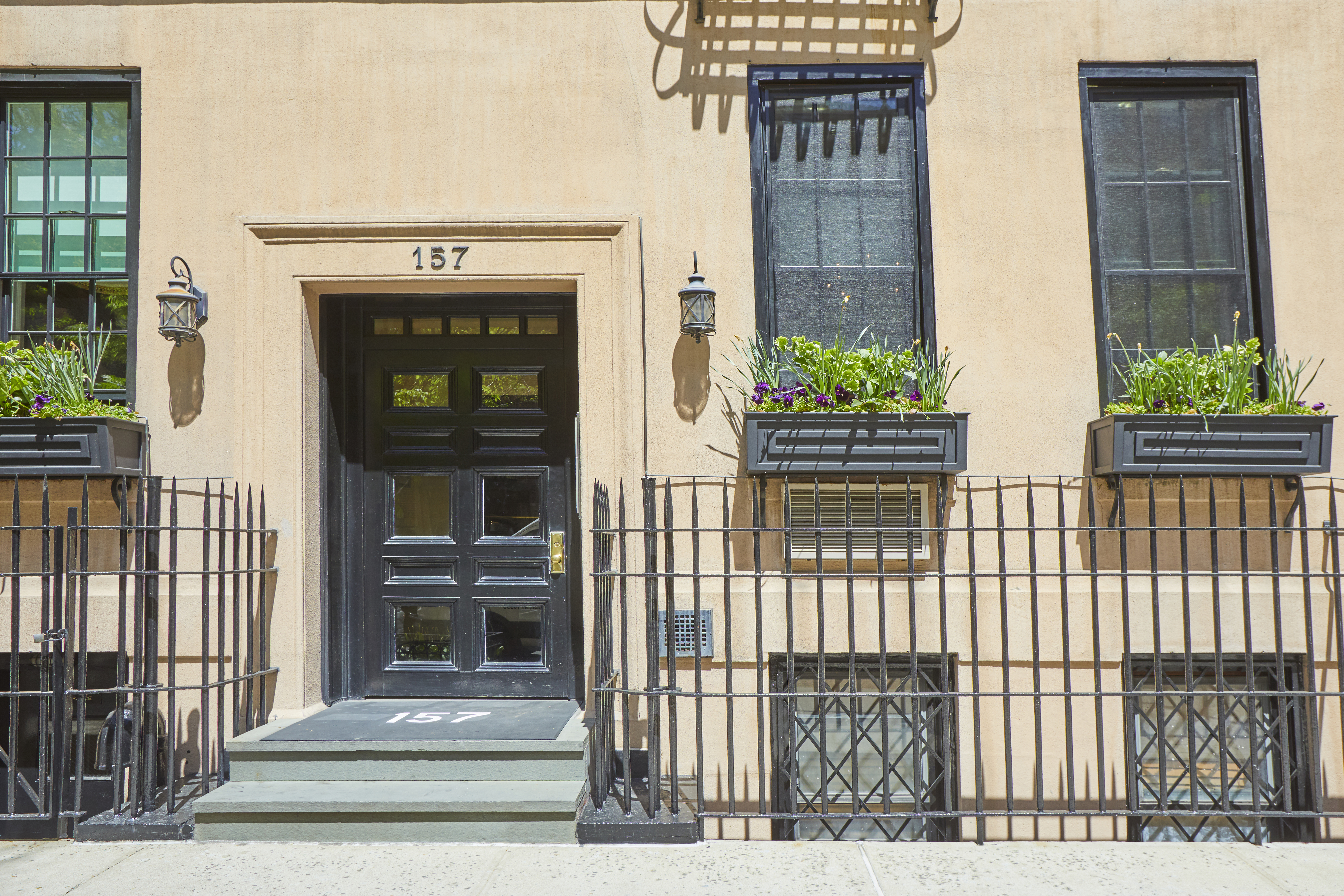 157 East 75th Street, Unit 1E Manhattan, NY 10021 - Photo 19 of 21 a view of a house with a porch