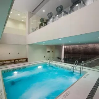 a room with pool table and outdoor seating