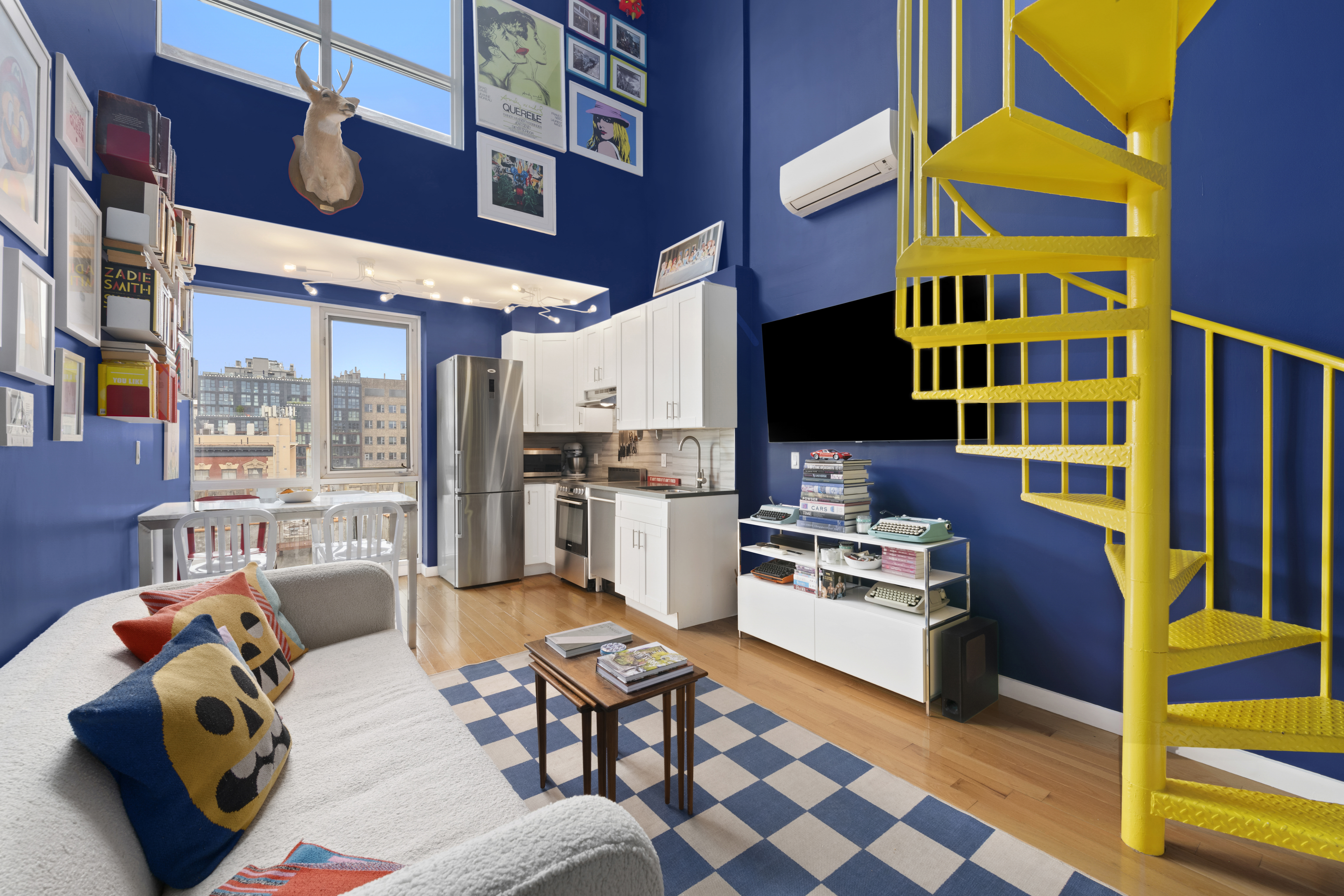 a kitchen that has a lot of cabinets