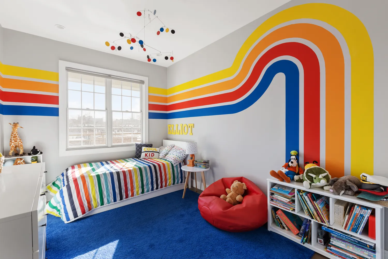 a living room with baby toys and furniture