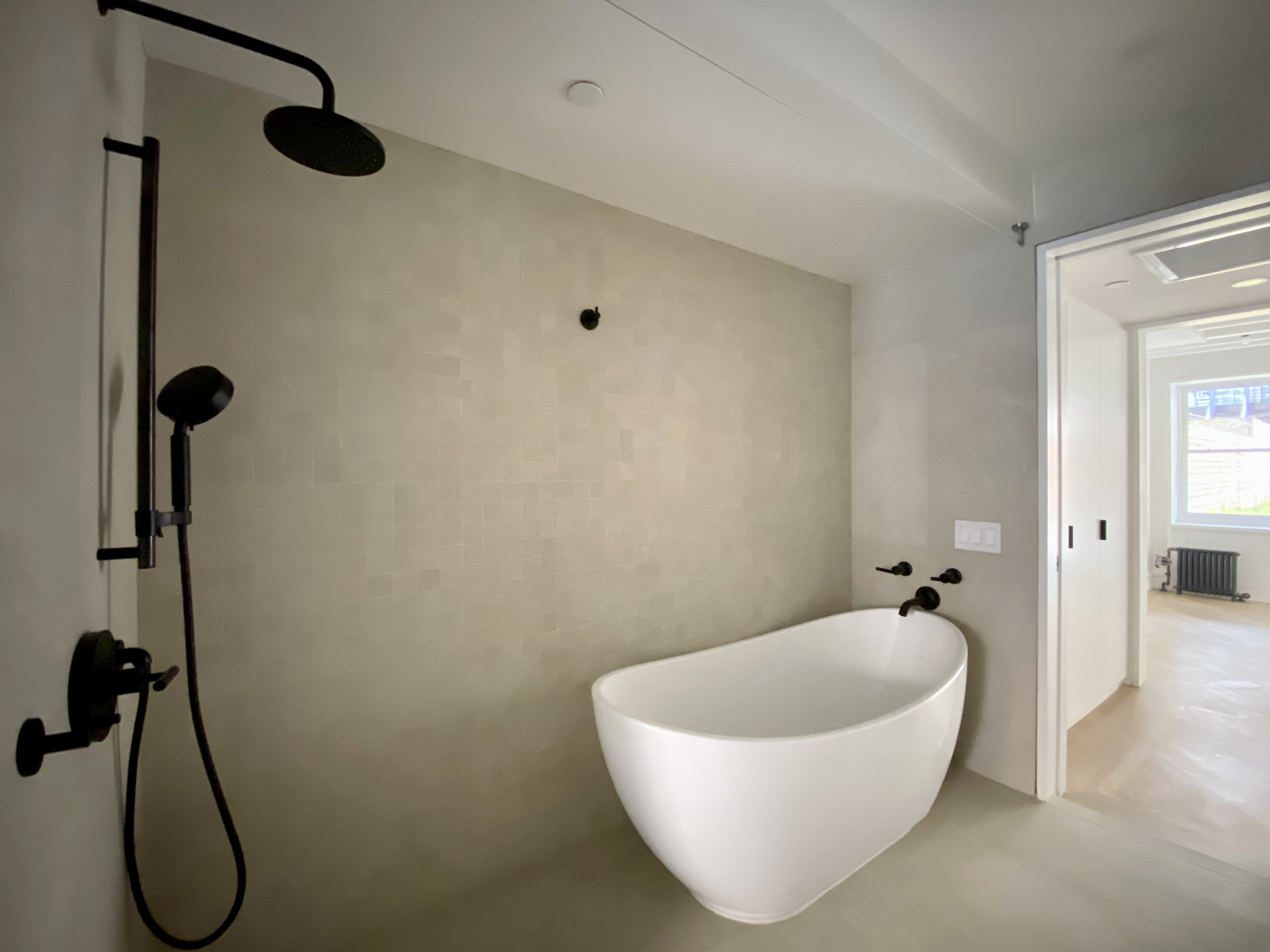 1420 Pacific Street, Unit 1 Brooklyn, NY 11216 - Photo 18 of 30 a bathroom with a bathtub