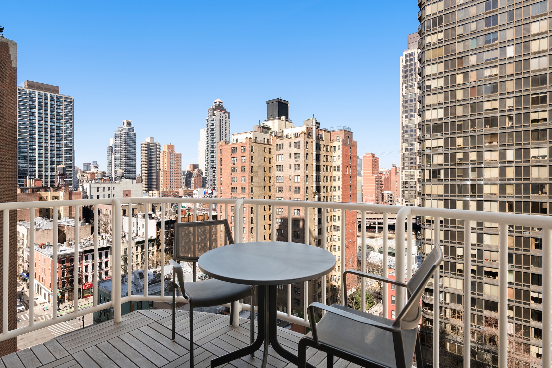 420 East 58th Street, Unit 14B Manhattan, NY 10022 - Photo 4 of 10 a view of a balcony with chairs