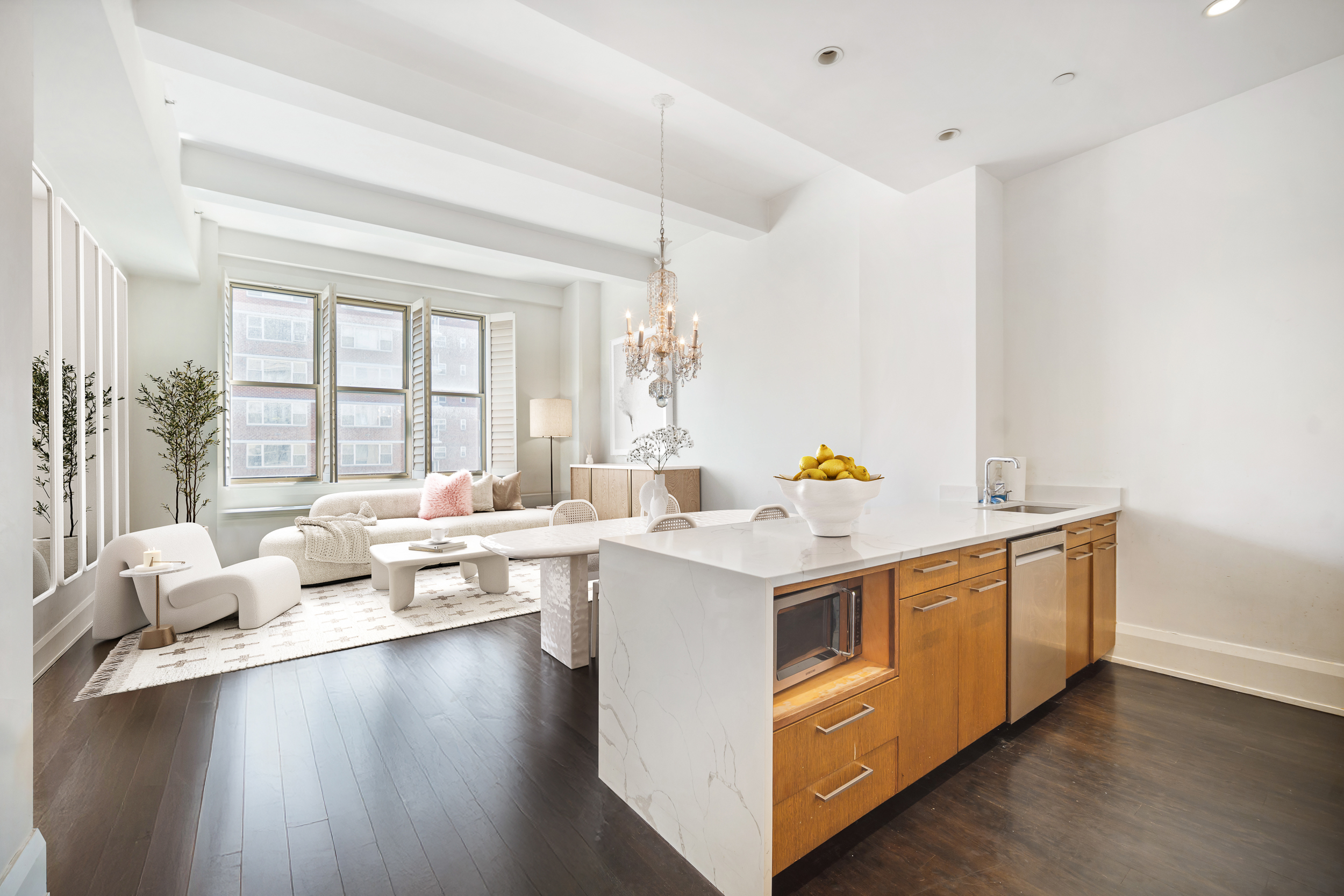 263 9th Avenue, Unit 7A Manhattan, NY 10001 - Photo 1 of 11 a view of living room with granite countertop furniture a couch and a large window