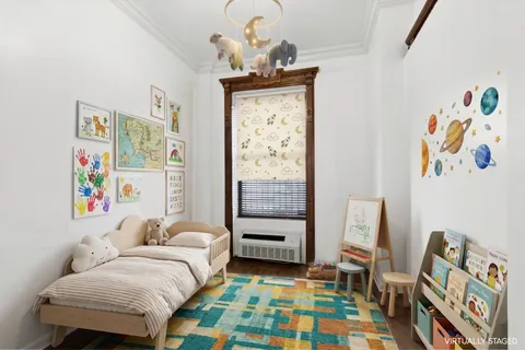 a bedroom with a bed and furniture