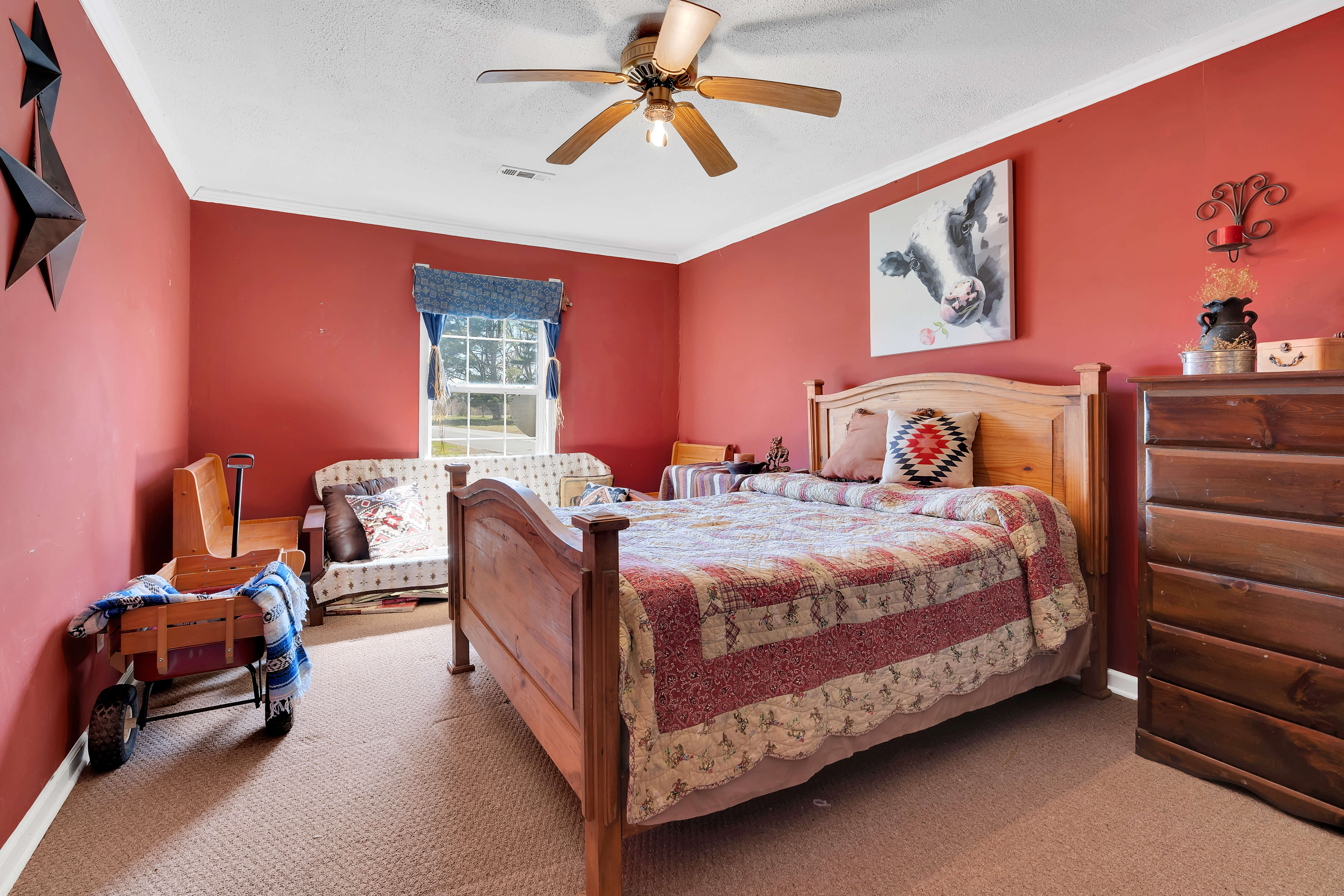 2073 Harpo Road Manchester, TN 37355 - Photo 36 of 45 a bedroom with a bed a chandelier and chair