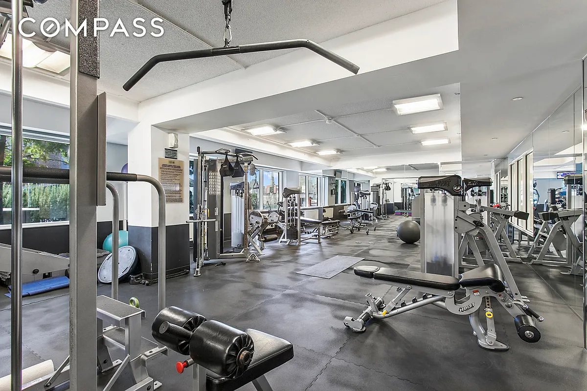 440 Kent Avenue, Unit 4A Brooklyn, NY 11249 - Photo 9 of 11 a view of a room with gym equipment