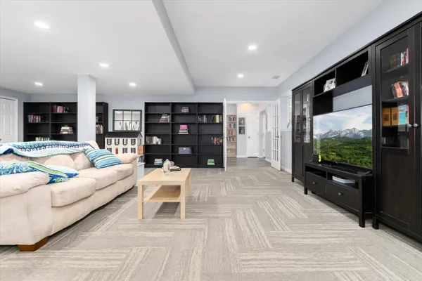 a bed room with a bed and a mirror