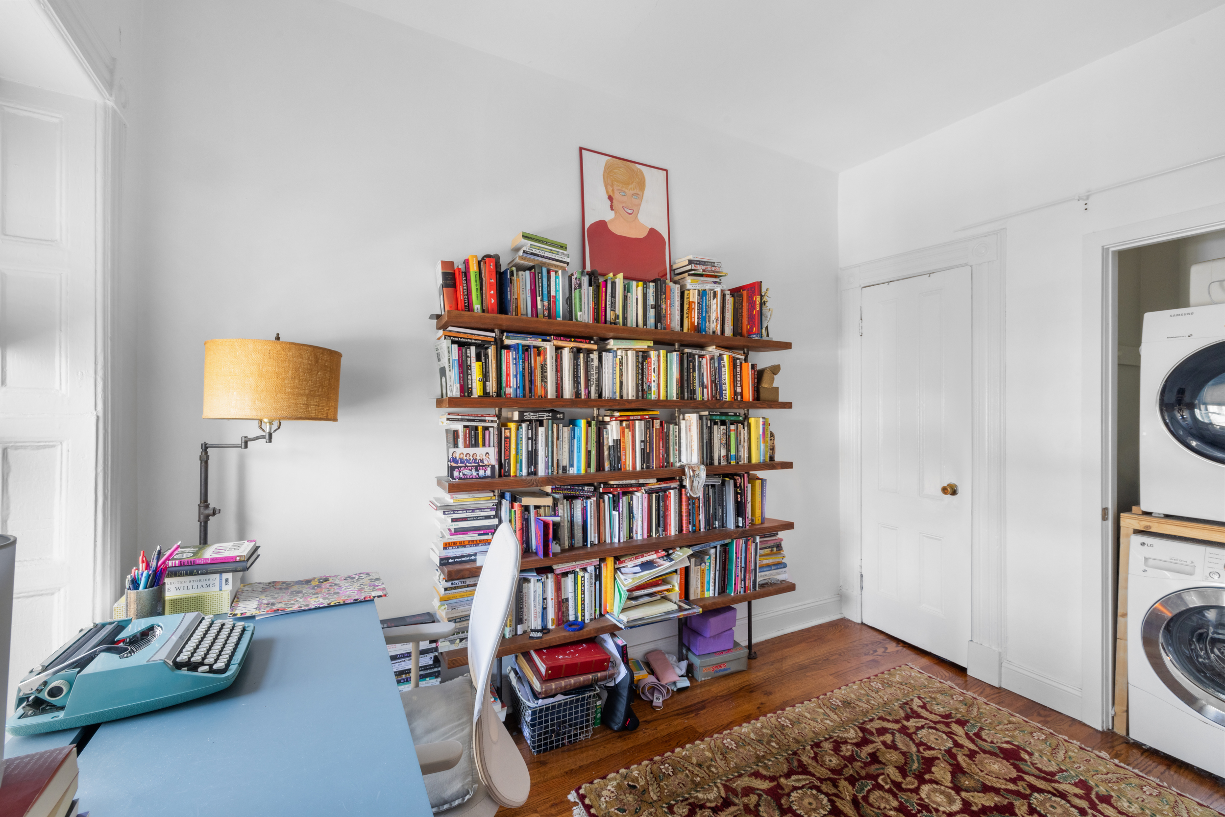 252 Stuyvesant Avenue Brooklyn, NY 11221 - Photo 24 of 26 a view of a workspace with furniture and toys