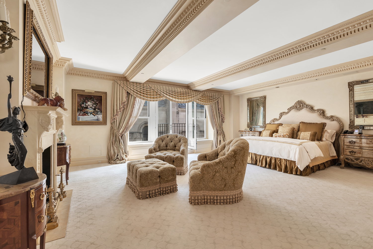 838 5th Avenue, Unit 6 Manhattan, NY 10065 - Photo 12 of 23 a bedroom with furniture and a flat screen tv