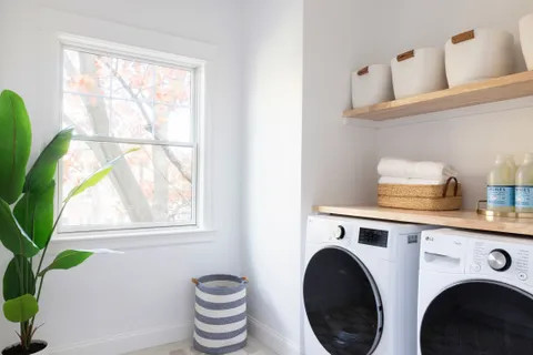 a utility room with dryer and washer