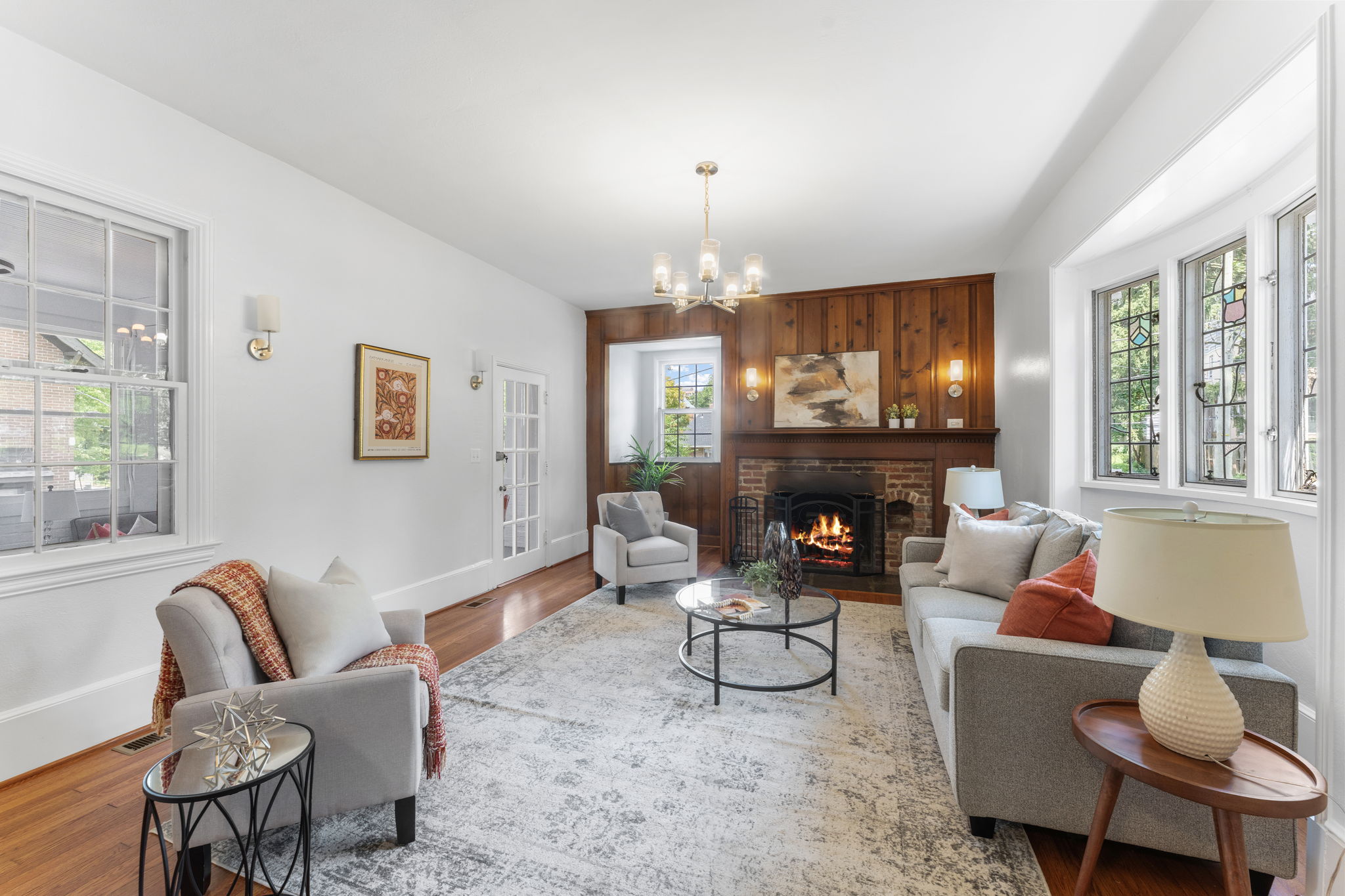 1325 Locust Road Northwest Washington, DC 20012 - Photo 9 of 56 a living room with furniture a fireplace and a large window