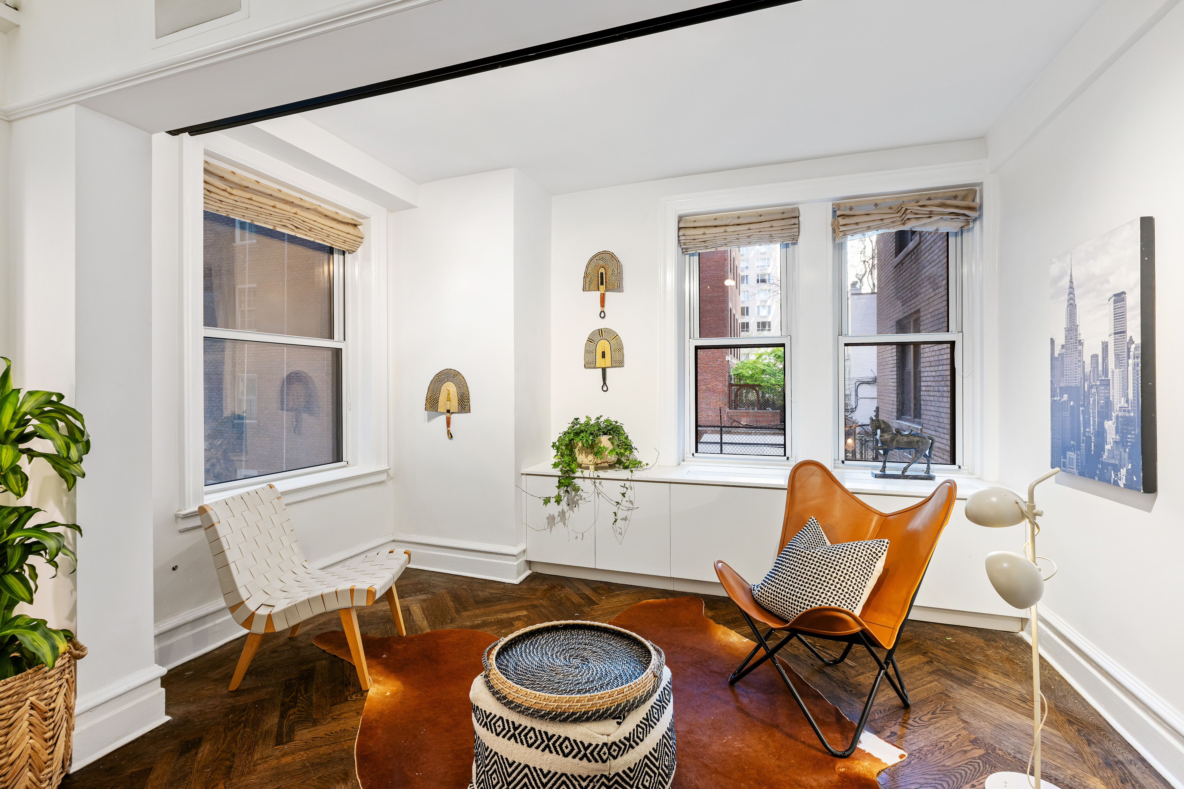 25 East 86th Street, Unit 1D Manhattan, NY 10028 - Photo 6 of 17 a view of a dining room with furniture window and wooden floor