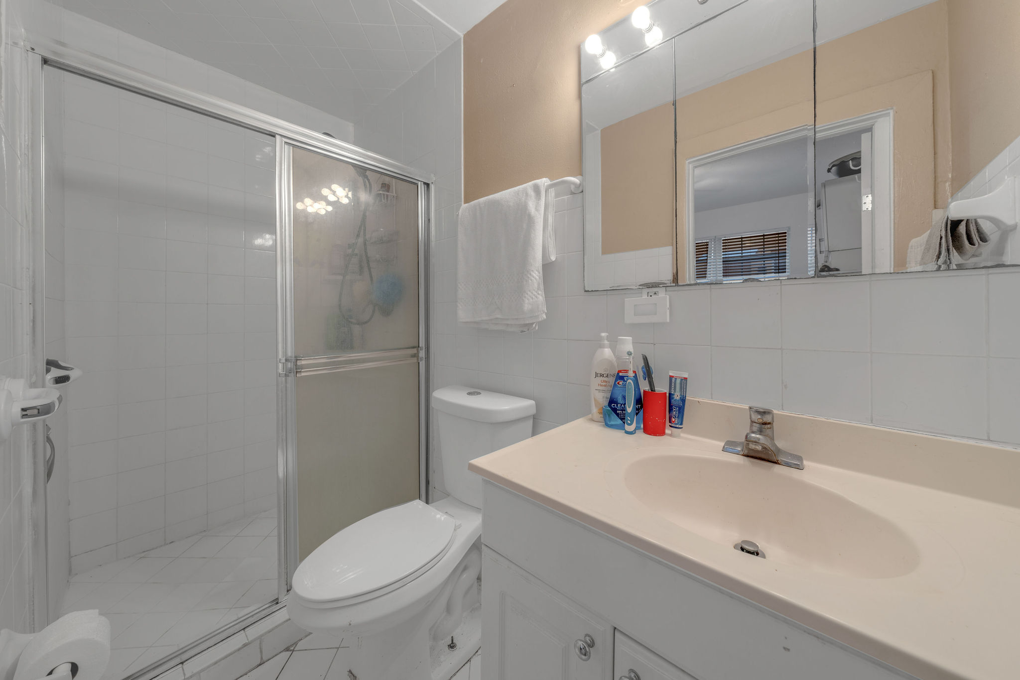 735-745 Meridian Avenue Miami Beach, FL 33139 - Photo 9 of 62 a bathroom with a sink toilet and shower