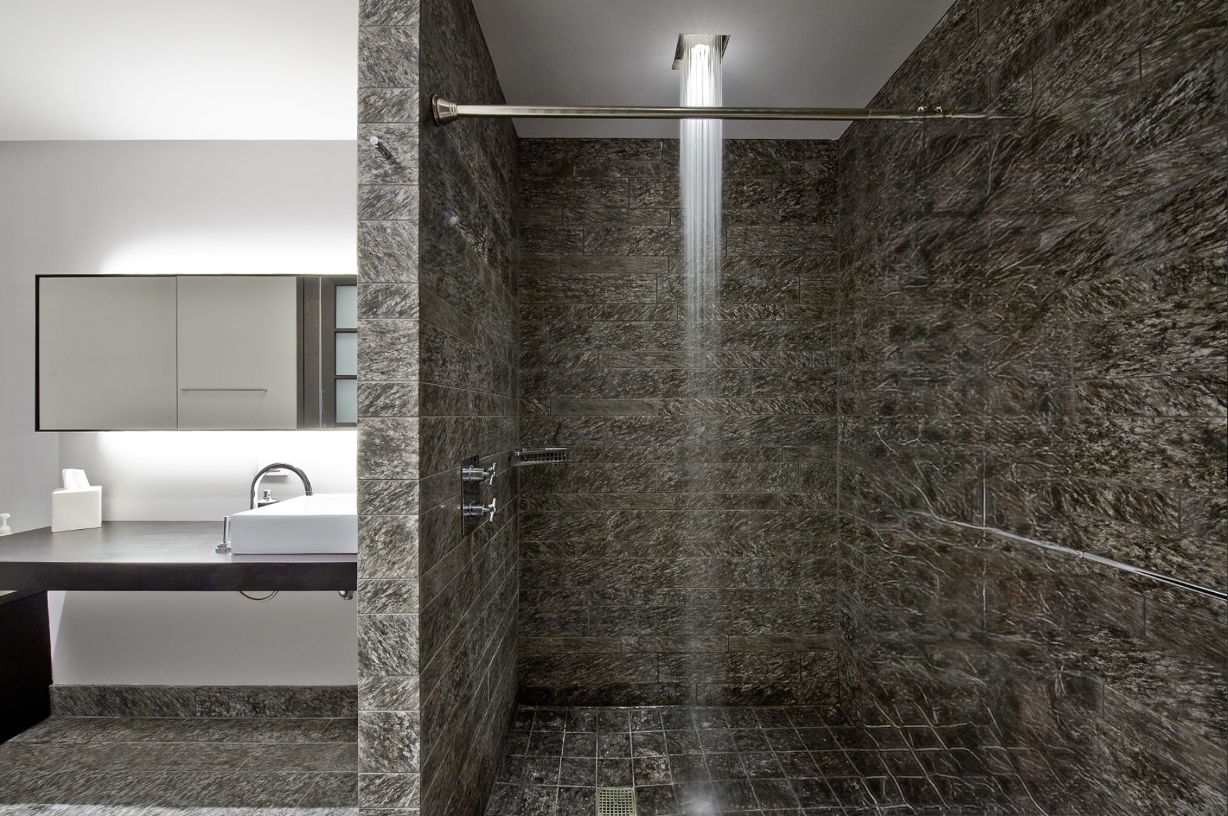 20 Pine Street, Unit 1415 Manhattan, NY 10005 - Photo 6 of 8 a bathroom with a shower and a sink