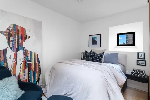 a bed room with a bed and a couch