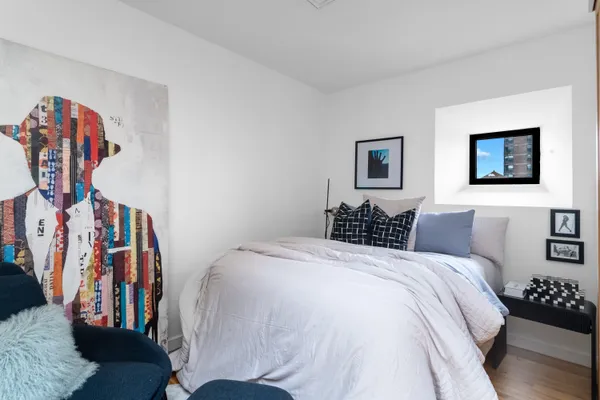 a bed room with a bed and a couch