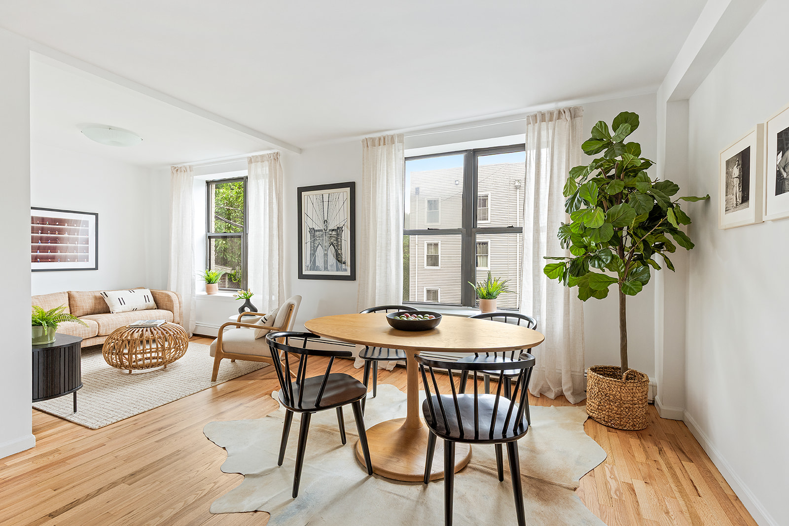 147 South Oxford Street, Unit 2C Brooklyn, NY 11217 - Photo 1 of 12 a dining room with furniture and window