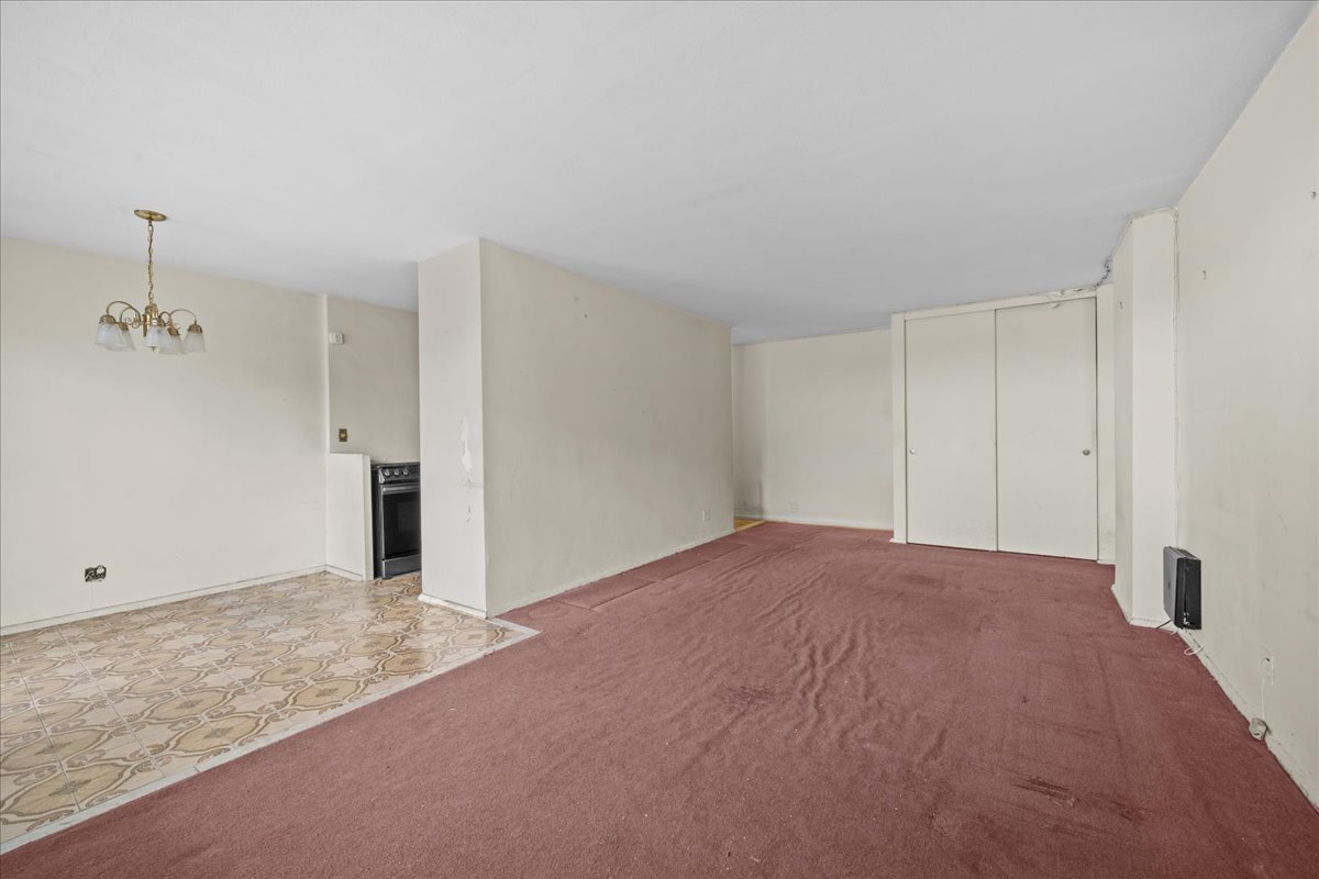 448 Neptune Avenue, Unit 16K Brooklyn, NY 11224 - Photo 2 of 28 a view of empty room with ceiling fan