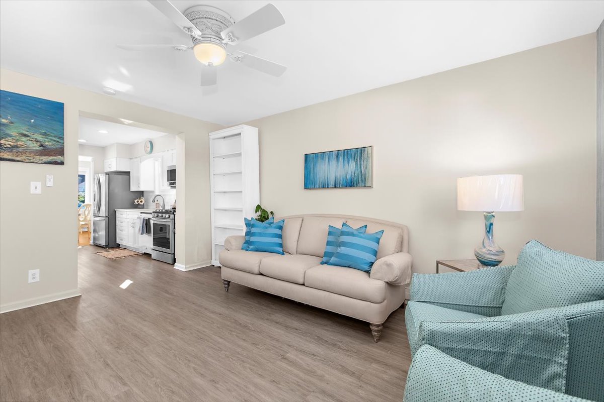 12712 Atherton Drive Silver Spring, MD 20906 - Photo 12 of 40 a living room with furniture and kitchen view