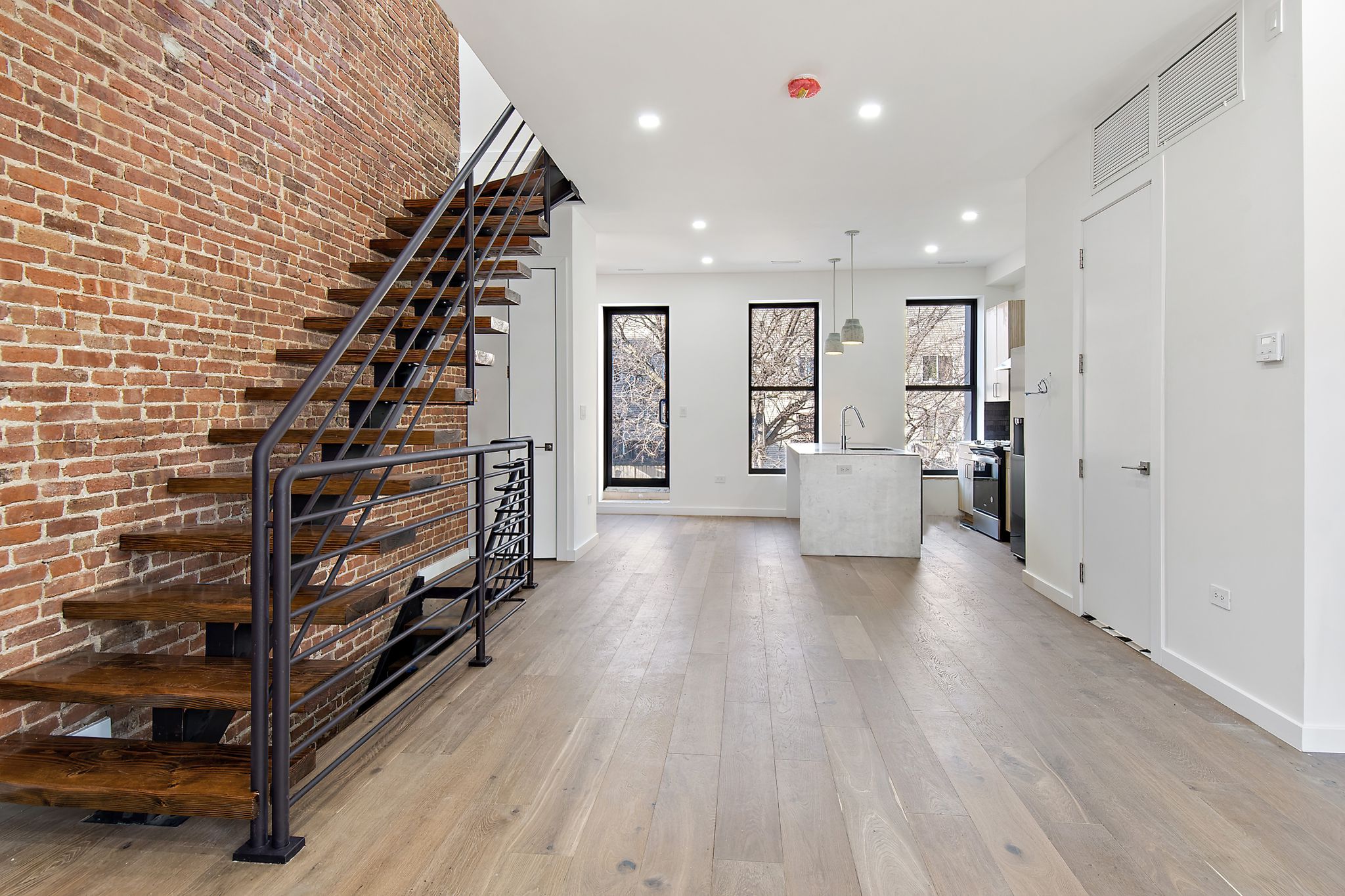 181 Kosciuszko Street Brooklyn, NY 11216 - Photo 3 of 20 a view of an entryway with wooden floor