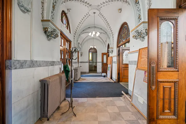 a view of a hallway with a entryway