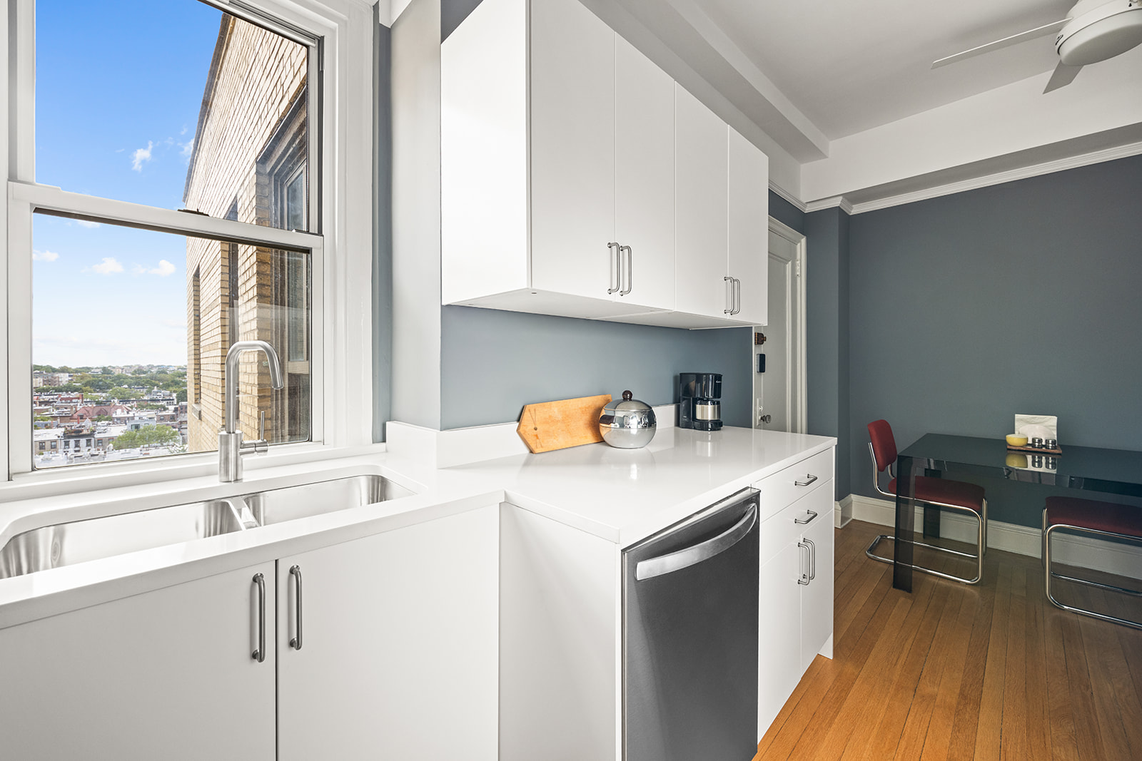 39 Plaza Street West, Unit 12B Brooklyn, NY 11217 - Photo 4 of 12 a kitchen with a sink a stove and a refrigerator