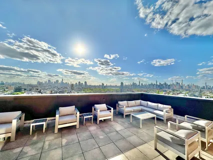 a view of a terrace with furniture