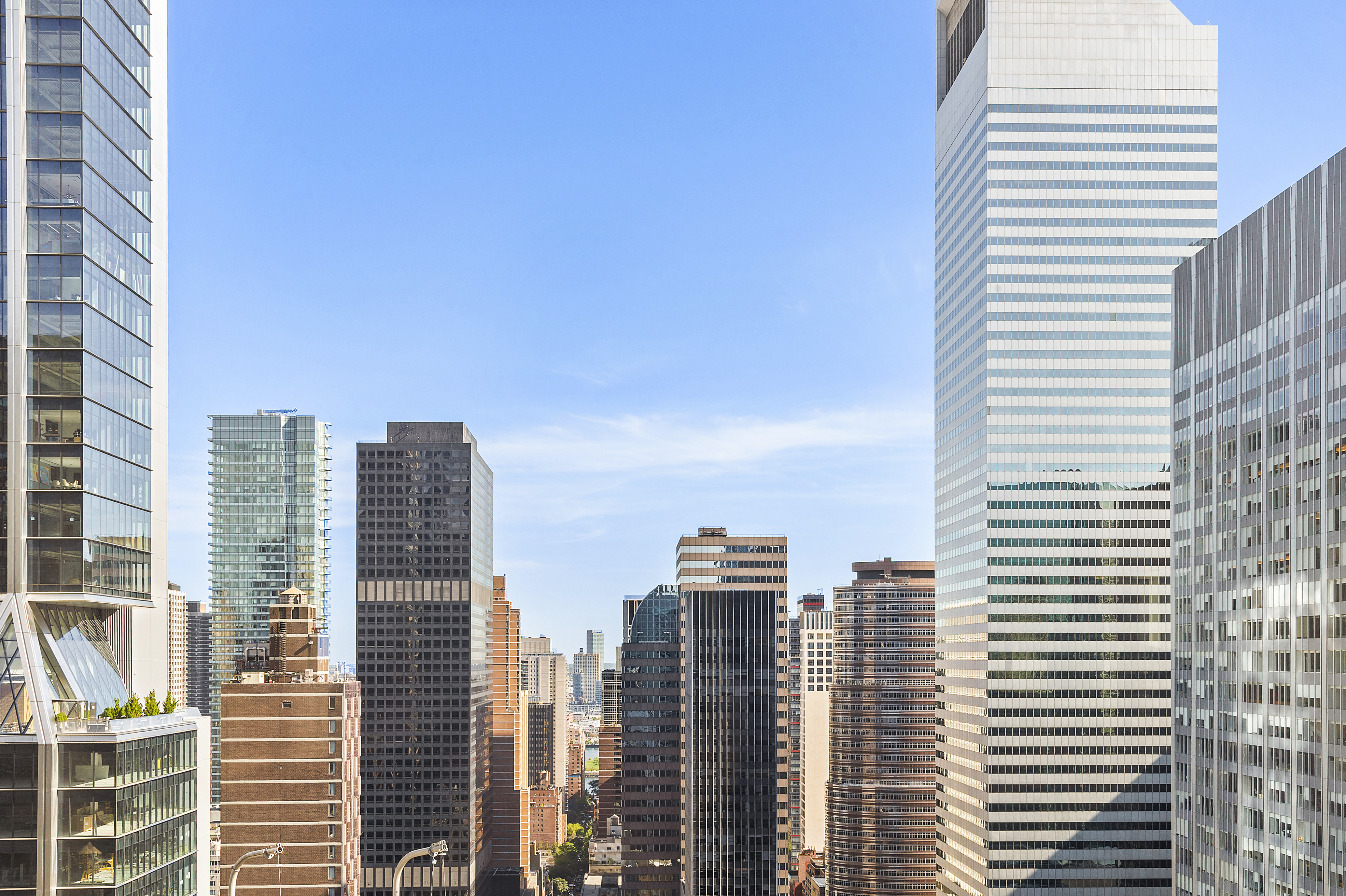 60 East 55th Street, Unit 40B Manhattan, NY 10022 - Photo 9 of 12 a view of city with tall buildings