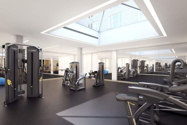 737 Park Avenue, Unit 6A Manhattan, NY 10021 - Photo 12 of 14 a gym room with lots of gym equipment