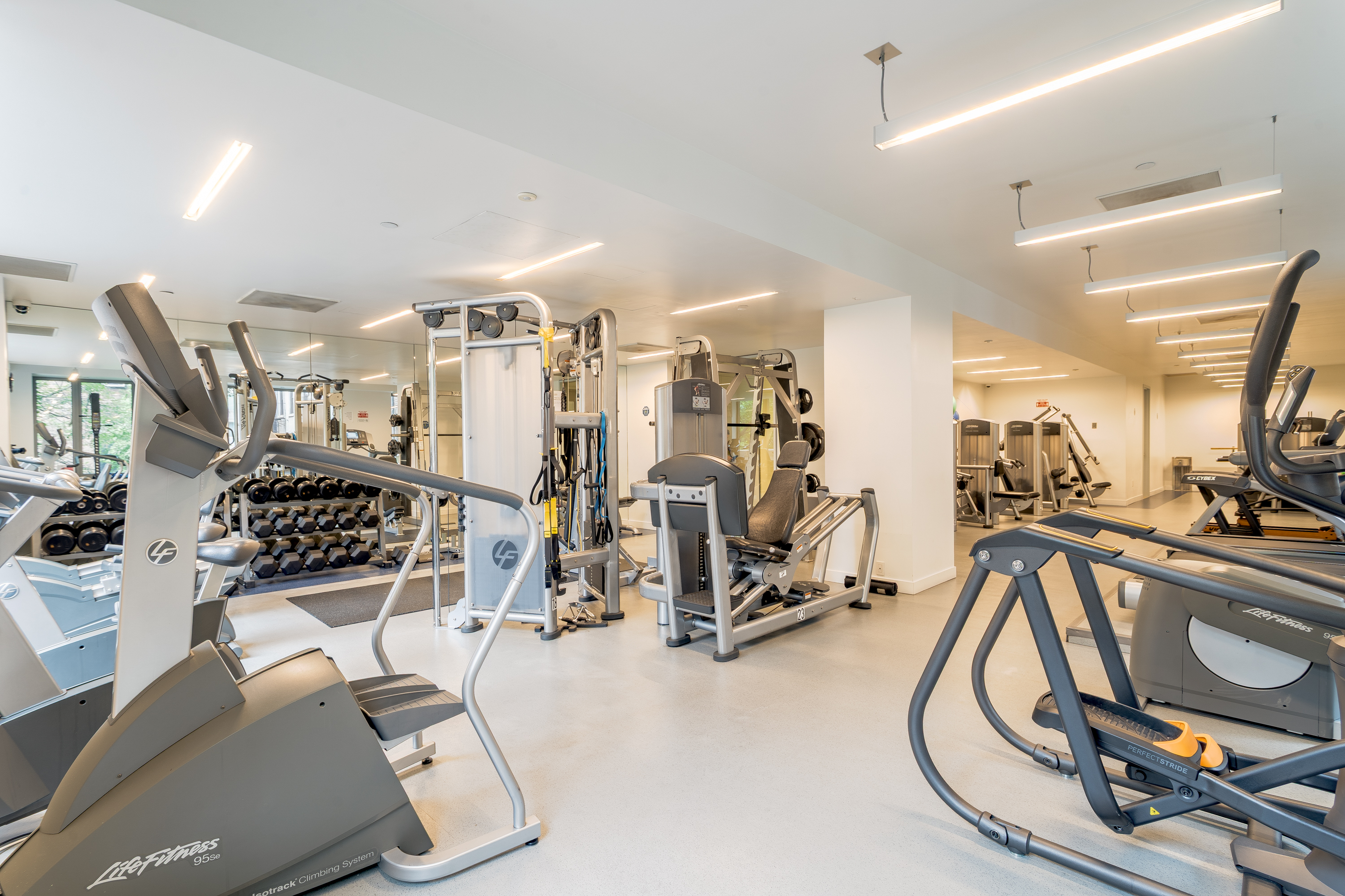 450 East 83rd Street, Unit 5K Manhattan, NY 10028 - Photo 13 of 16 a view of a room with gym equipment