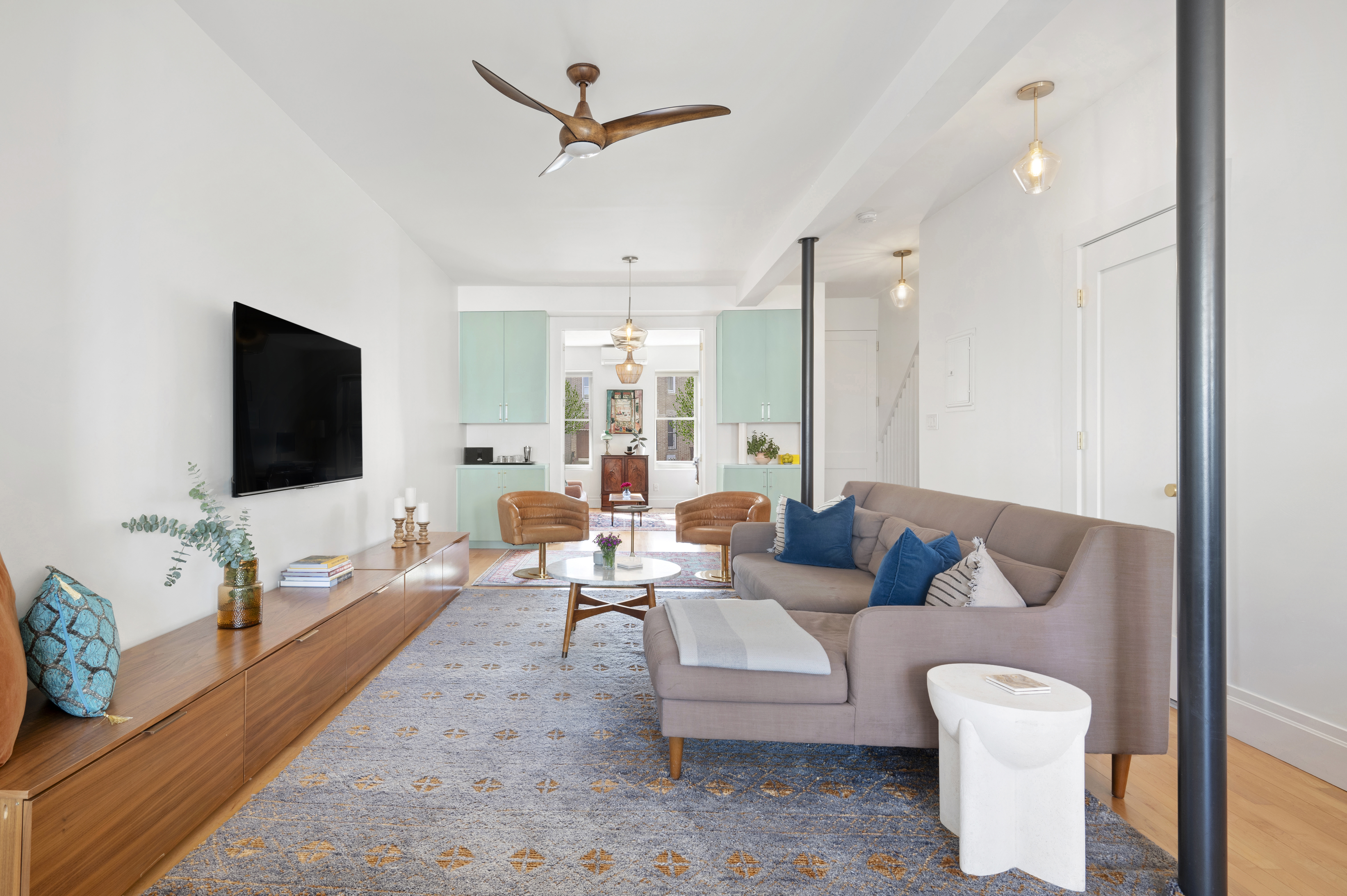 185 East 31st Street Brooklyn, NY 11226 - Photo 4 of 23 a living room with furniture and a flat screen tv