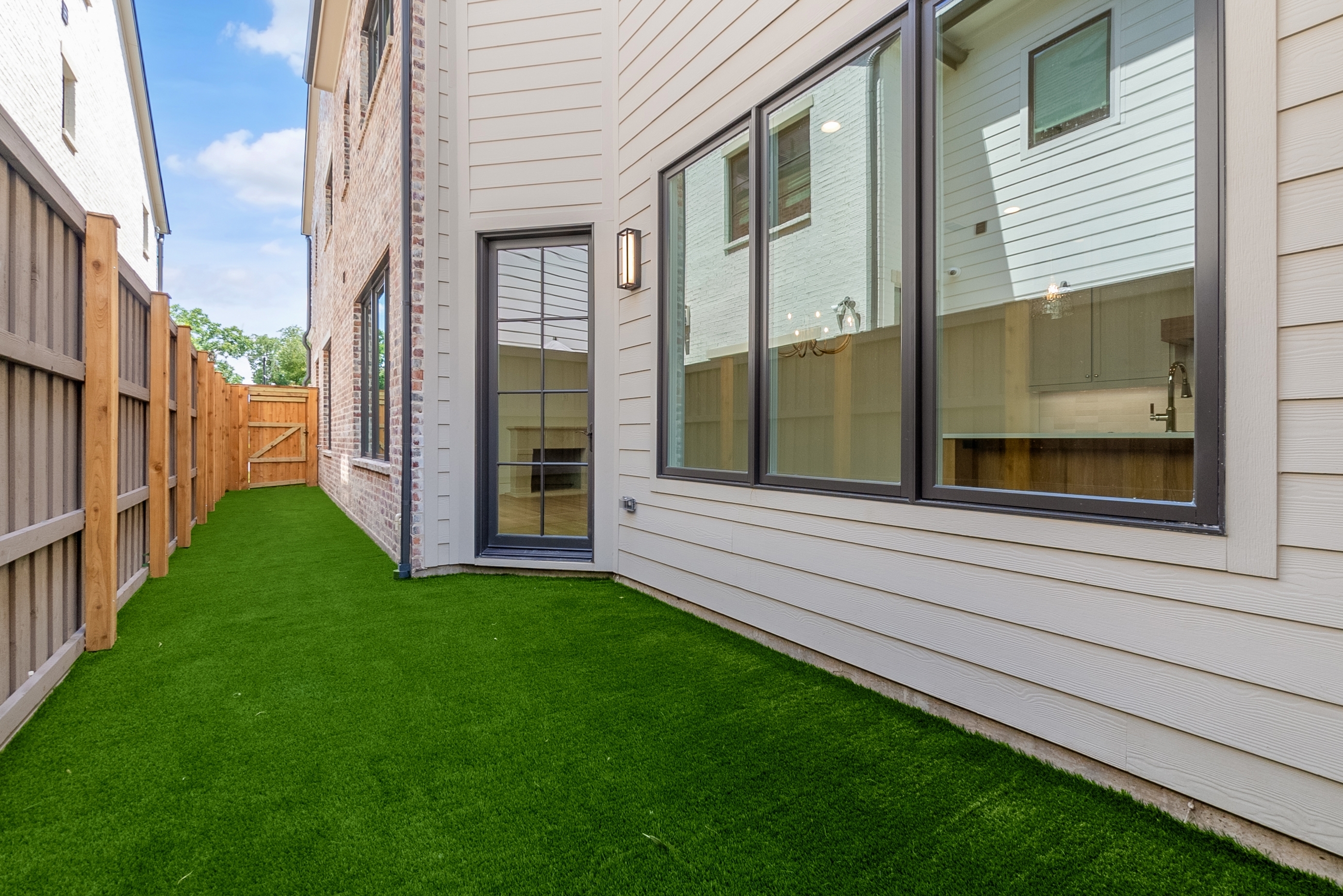 4410 Glenwick Lane Dallas, TX 75205 - Photo 23 of 28 a view of a house with a yard and stairs