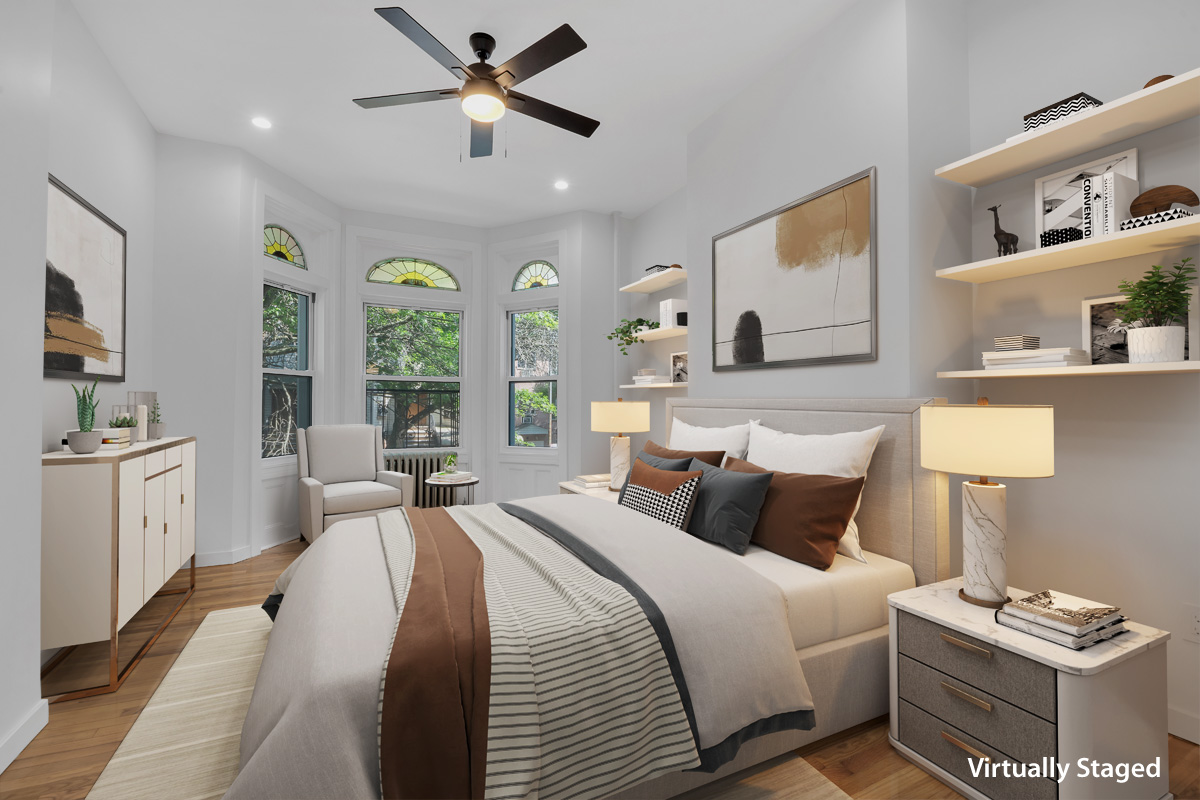 1275 Jefferson Avenue, Unit 2 Brooklyn, NY 11221 - Photo 5 of 11 a bedroom with a large bed and a window