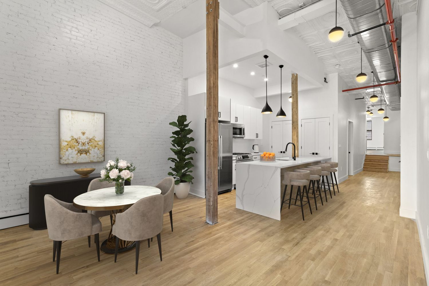 717 Manhattan Avenue, Unit 2A Brooklyn, NY 11222 - Photo 3 of 17 a view of a dining room with furniture and wooden floor