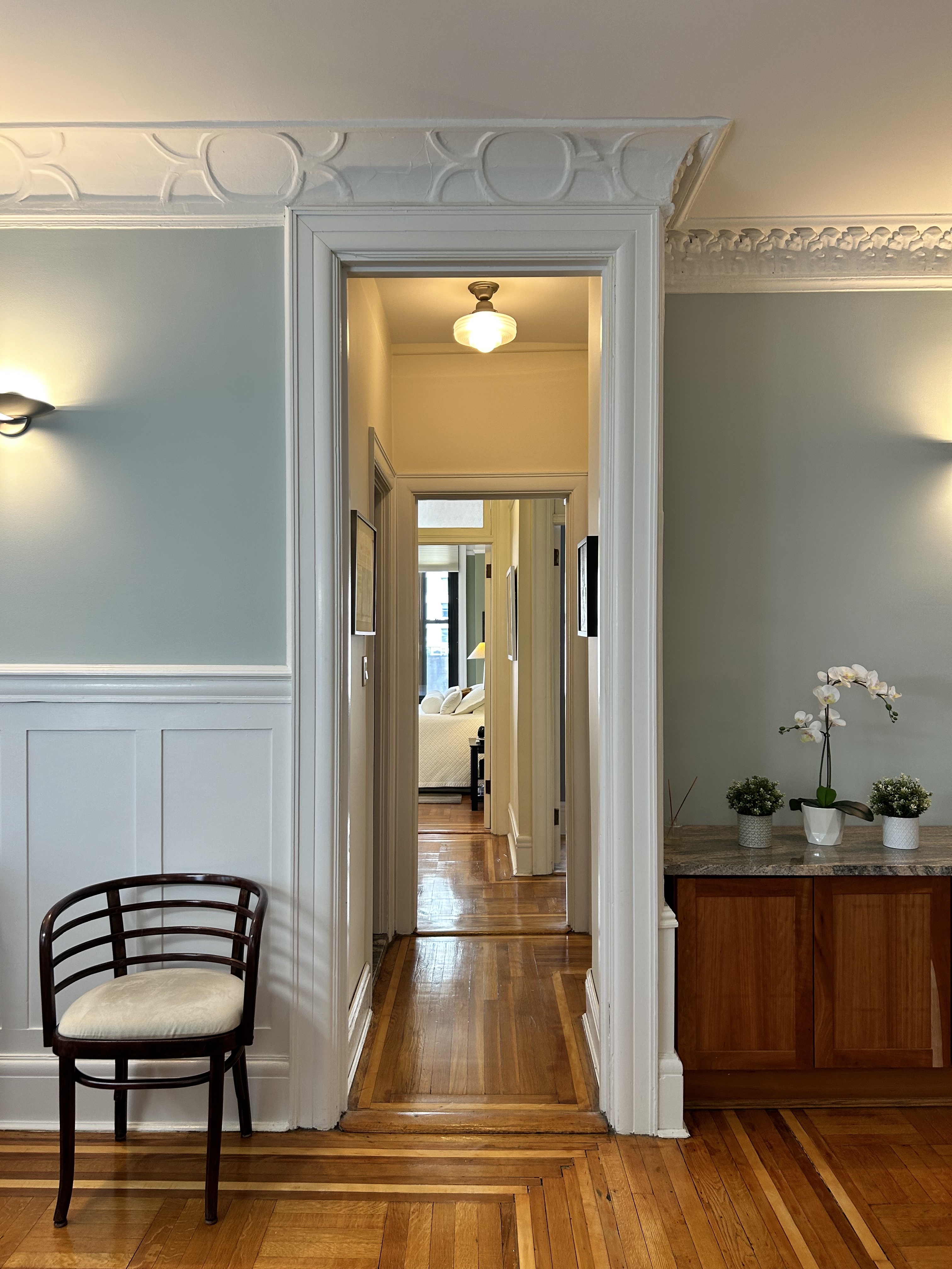 200 West 54th Street, Unit 9G Manhattan, NY 10019 - Photo 7 of 17 a room with furniture and gym equipment