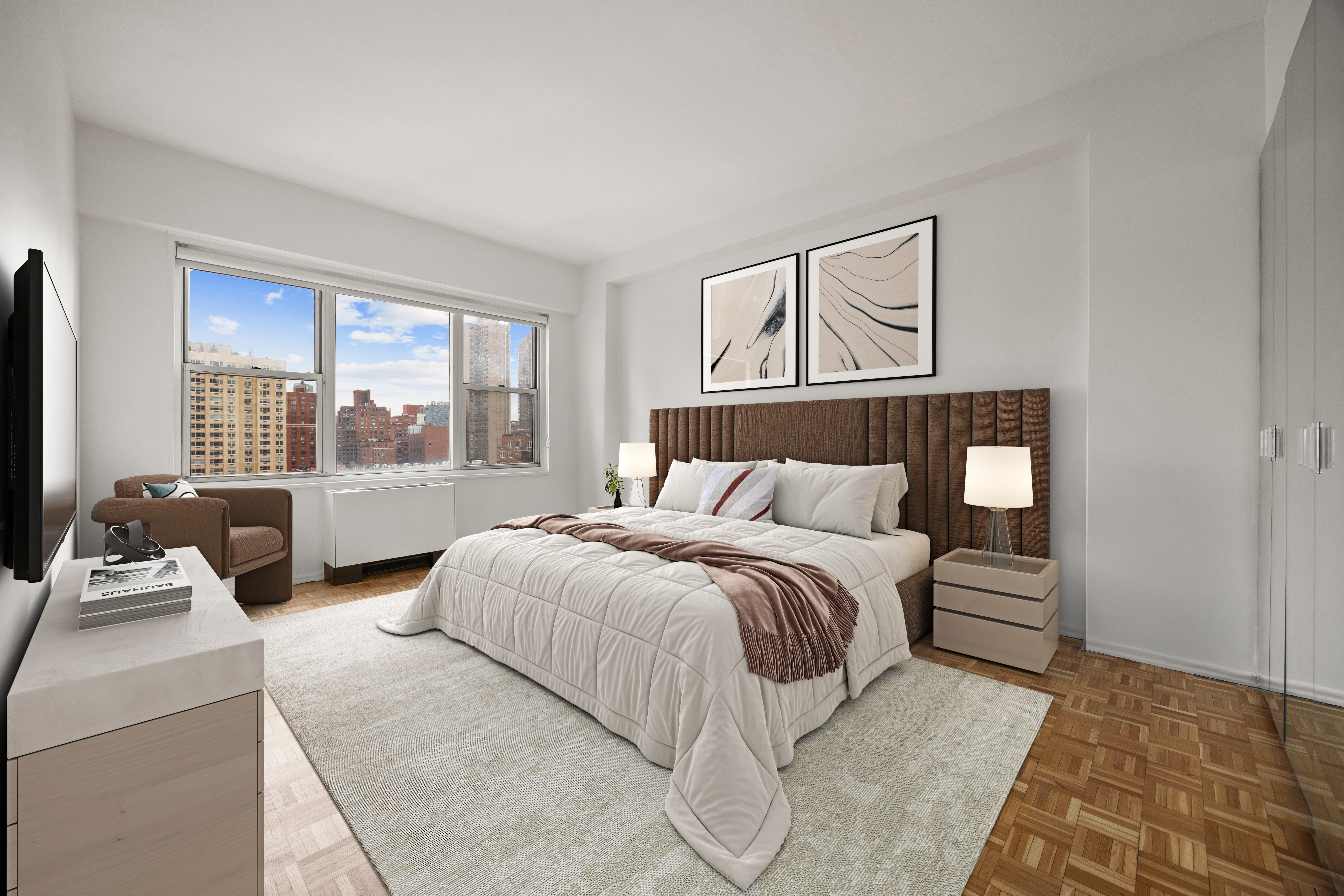 400 East 85th Street, Unit 14A Manhattan, NY 10028 - Photo 5 of 8 a bedroom with a bed and glass window