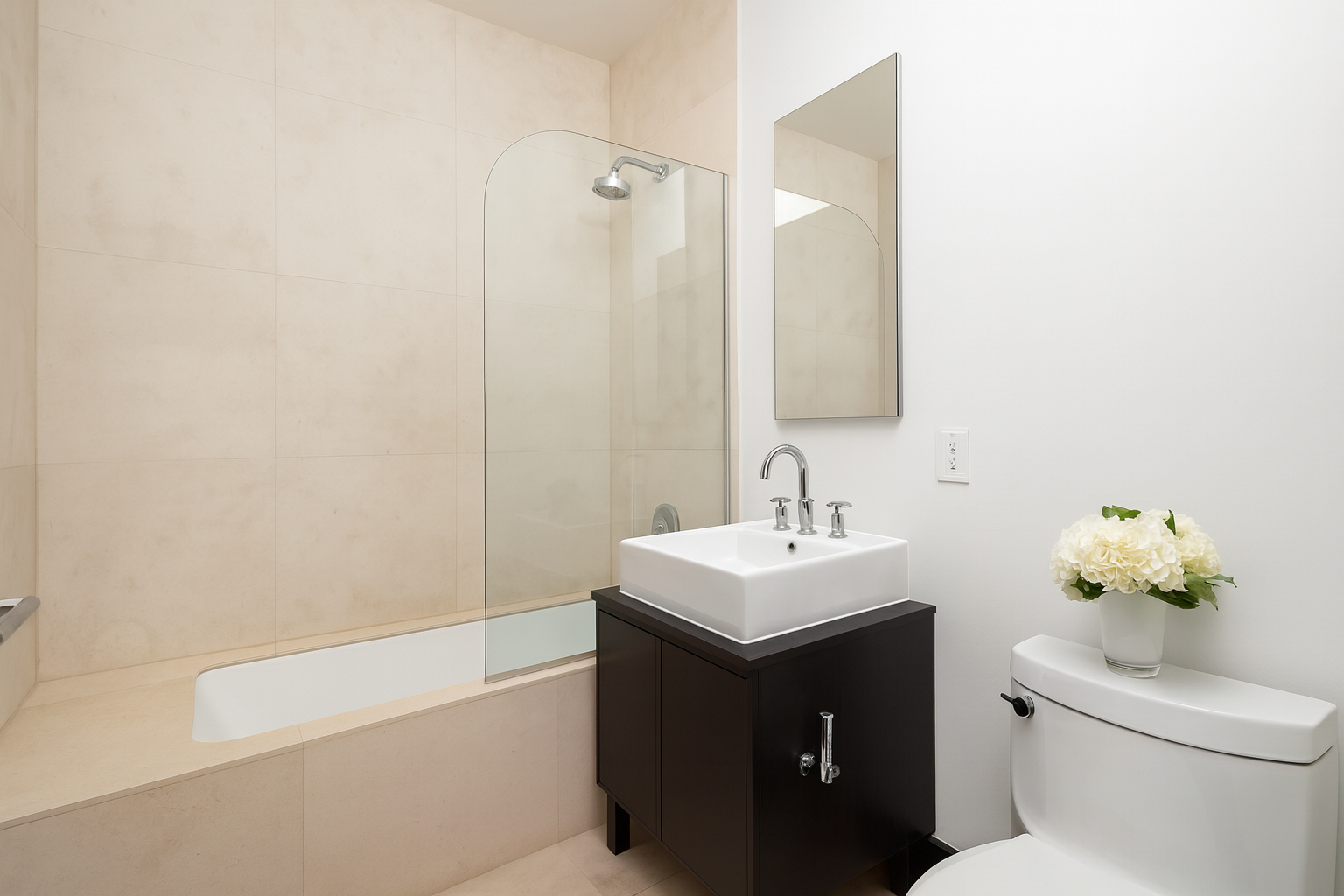 Park Ave S, Unit 7PR Manhattan, NY 10010 - Photo 10 of 15 a bathroom with a sink toilet and vanity