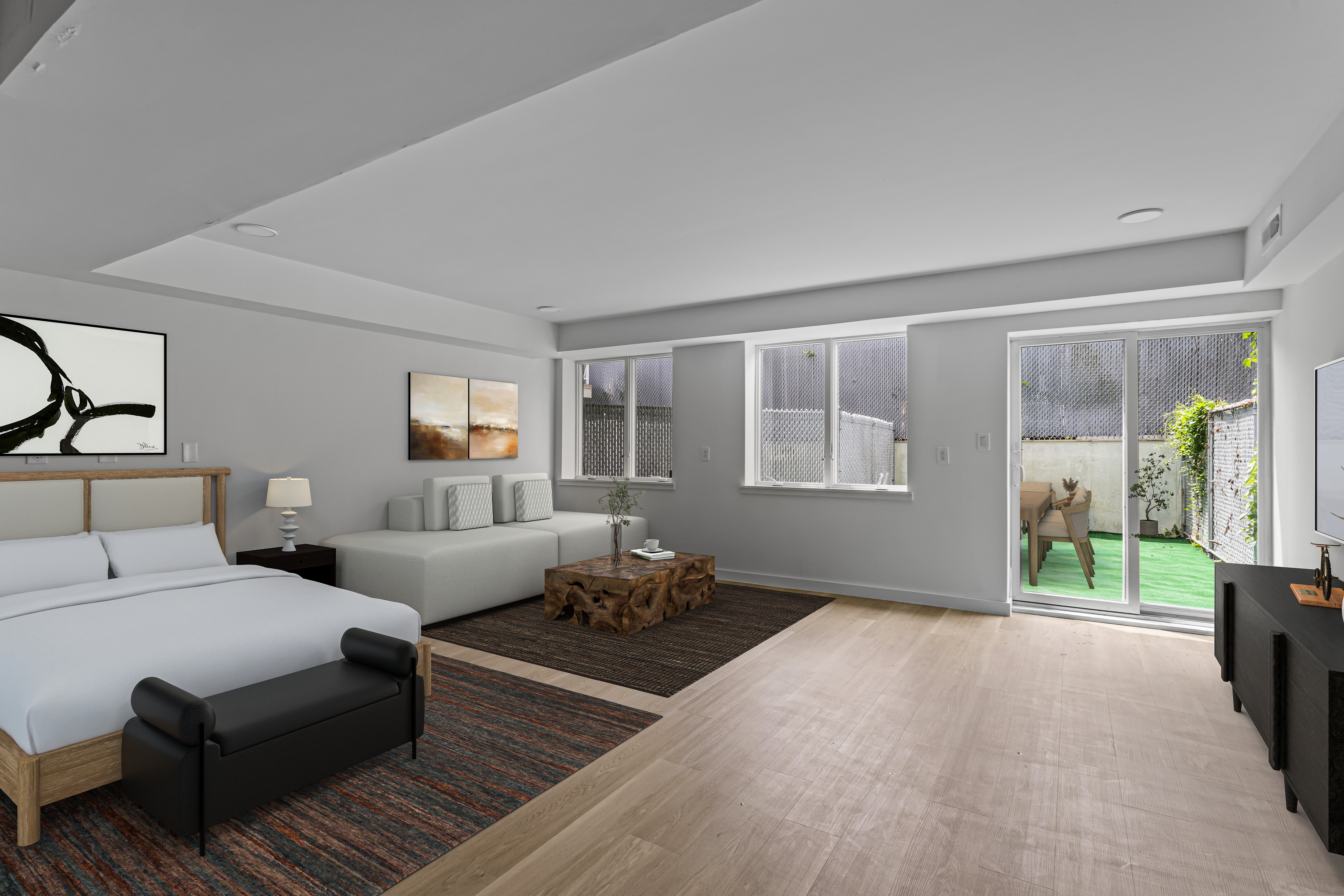 3112 Emmons Avenue, Unit 3120A-2 Brooklyn, NY 11235 - Photo 5 of 14 a living room with furniture and a window