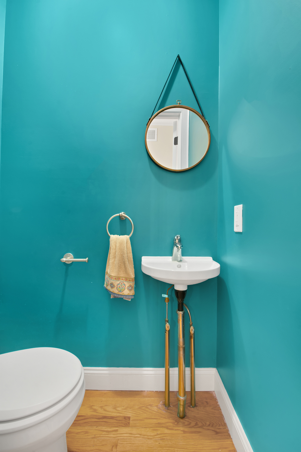 11 Nixon Avenue Staten Island, NY 10304 - Photo 15 of 29 a bathroom with a sink a mirror and a toilet