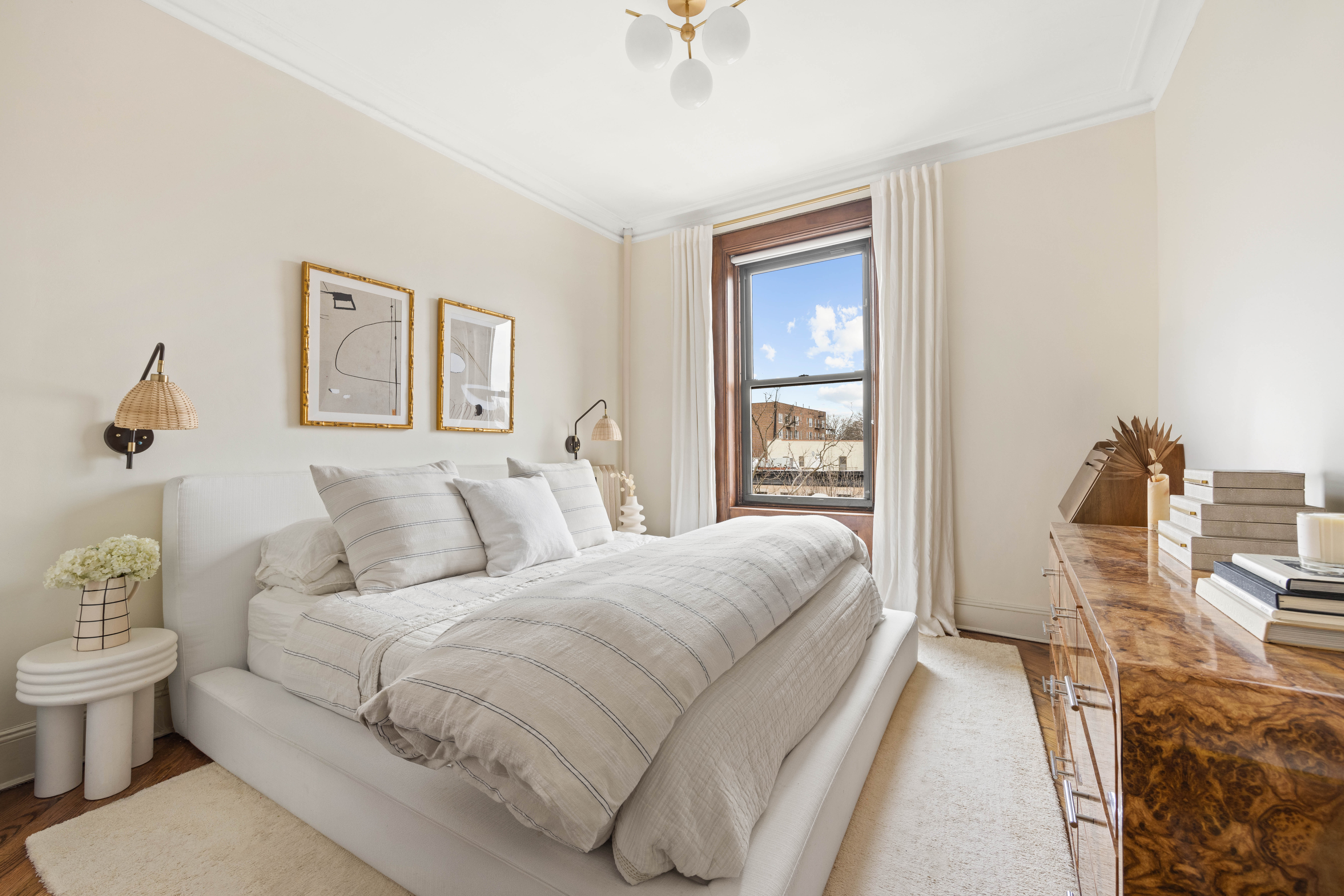 240 Prospect Place, Unit 9 Brooklyn, NY 11238 - Photo 6 of 11 a bedroom with a bed and wooden floor